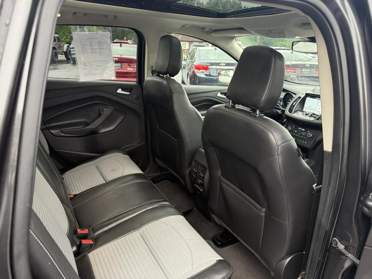2019 Black /Black Ford Escape Titanium 4WD (1FMCU9J95KU) with an 2.0L I4 DOHC 16V TURBO engine, 6 Speed Auto transmission, located at 547 E. Main St., Orwell, OH, 44076, (440) 437-5893, 41.535435, -80.847855 - Photo#32