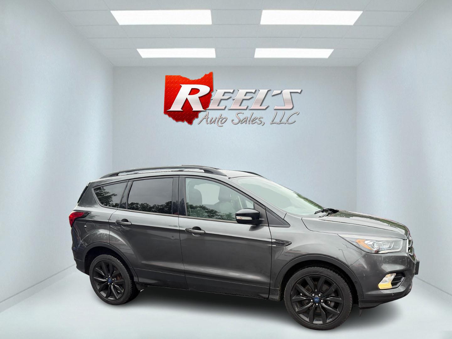 2019 Black /Black Ford Escape Titanium 4WD (1FMCU9J95KU) with an 2.0L I4 DOHC 16V TURBO engine, 6 Speed Auto transmission, located at 547 E. Main St., Orwell, OH, 44076, (440) 437-5893, 41.535435, -80.847855 - Photo#39