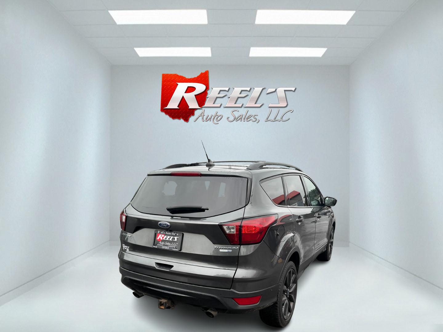 2019 Black /Black Ford Escape Titanium 4WD (1FMCU9J95KU) with an 2.0L I4 DOHC 16V TURBO engine, 6 Speed Auto transmission, located at 547 E. Main St., Orwell, OH, 44076, (440) 437-5893, 41.535435, -80.847855 - Photo#41