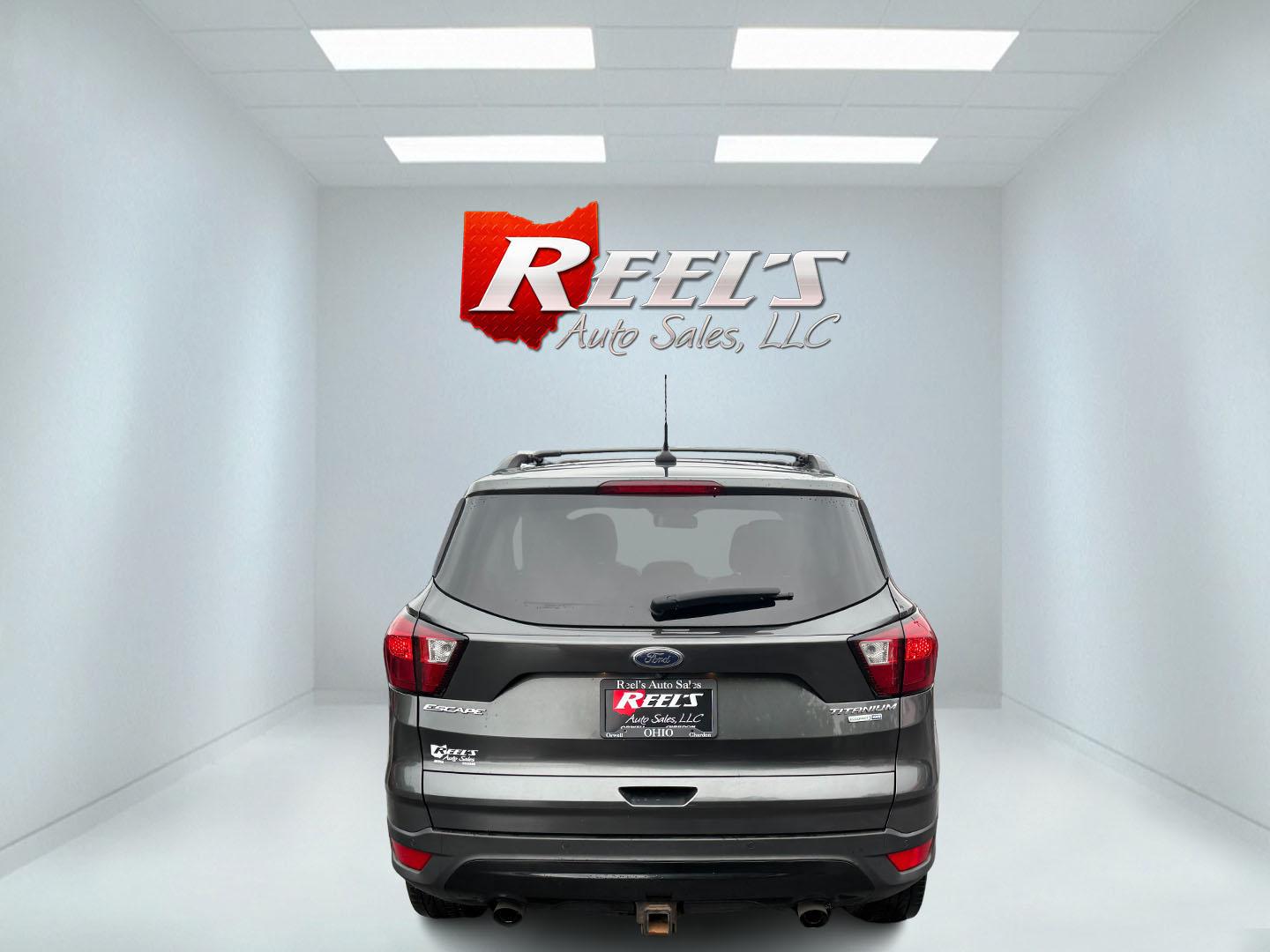 2019 Black /Black Ford Escape Titanium 4WD (1FMCU9J95KU) with an 2.0L I4 DOHC 16V TURBO engine, 6 Speed Auto transmission, located at 547 E. Main St., Orwell, OH, 44076, (440) 437-5893, 41.535435, -80.847855 - Photo#42