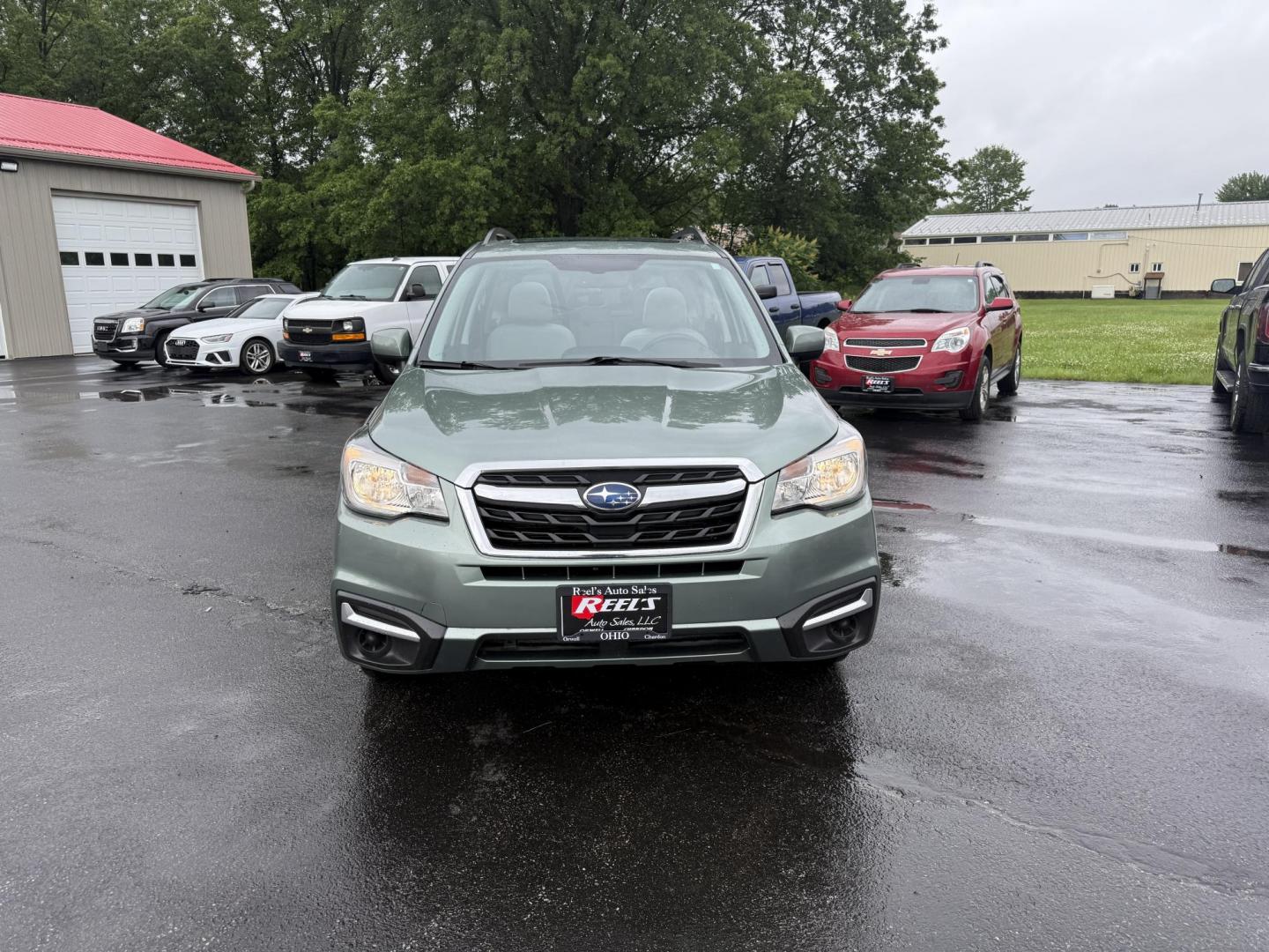 2017 Green /Gray Subaru Forester 2.5i Premium PZEV CVT (JF2SJAEC0HH) with an 2.5L H4 DOHC 16V engine, Automatic transmission, located at 547 E. Main St., Orwell, OH, 44076, (440) 437-5893, 41.535435, -80.847855 - This One Owner 2017 Subaru Forester Premium with the 2.5L H4 engine and Symmetrical AWD offers a reliable and efficient SUV, achieving around 32 MPG on the highway. It features a 7.0-inch touchscreen with HD Radio and backup camera, heated front seats, power driver’s seat, and a power panoramic mo - Photo#1