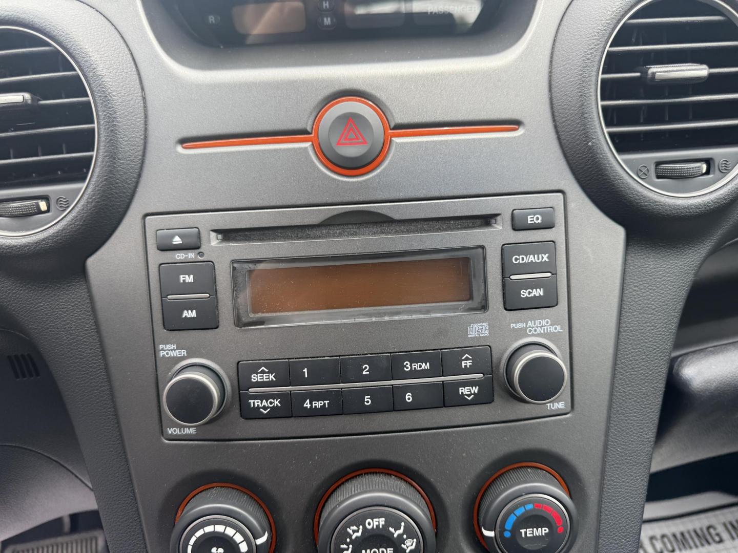 2008 Gray /Black Kia Rondo LX V6 (KNAFG526887) with an 2.7L V6 DOHC 24V engine, 5 Speed Automatic transmission, located at 547 E. Main St., Orwell, OH, 44076, (440) 437-5893, 41.535435, -80.847855 - This 2008 Kia Rondo LX 2.7 V6 with a 5-speed automatic transmission offers seating for seven, making it a practical choice for families or groups, and boasts a respectable 26 MPG highway fuel efficiency. Equipped with auxiliary audio input, it provides convenient connectivity for your devices. Its v - Photo#15