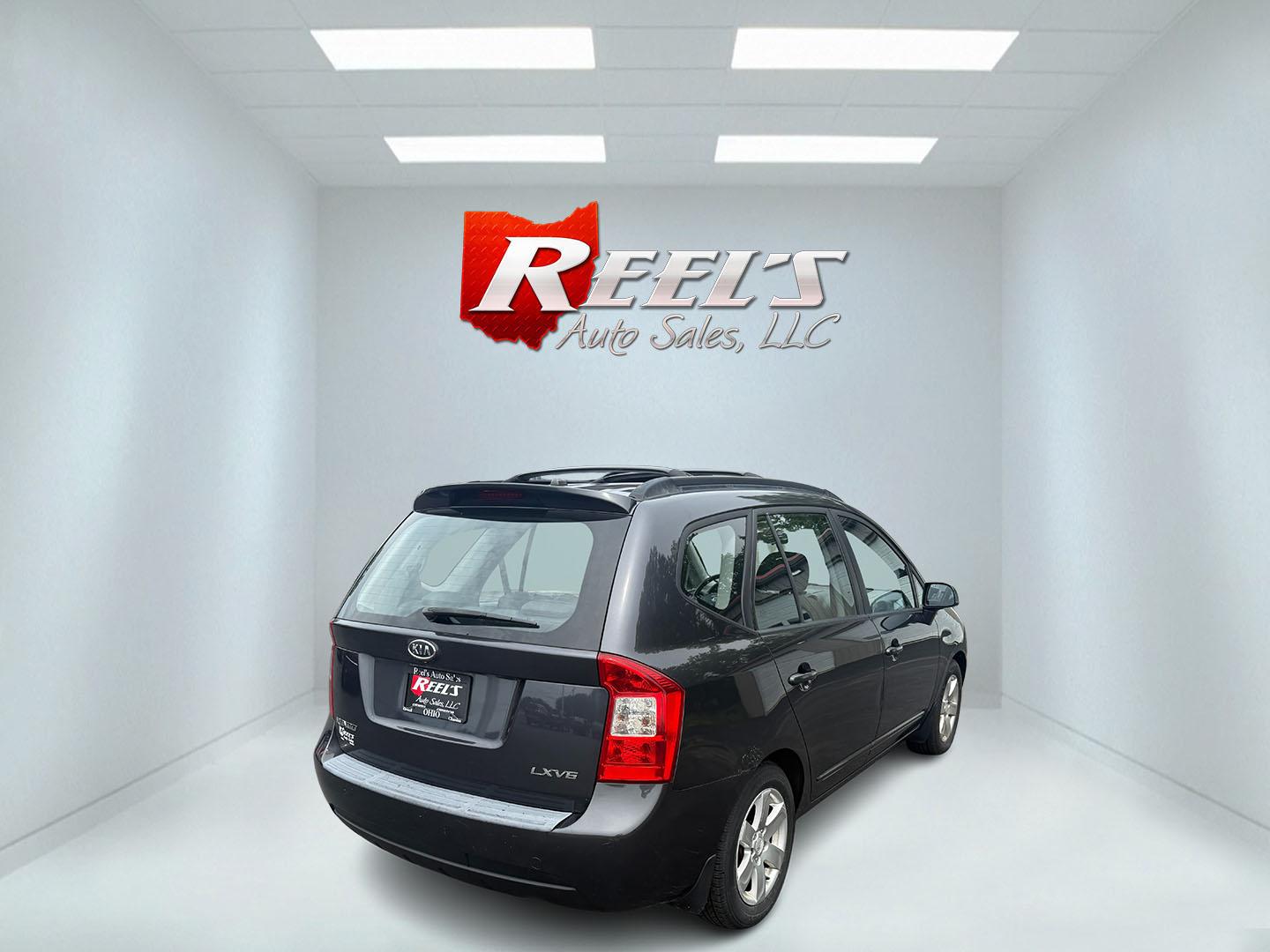 2008 Gray /Black Kia Rondo LX V6 (KNAFG526887) with an 2.7L V6 DOHC 24V engine, 5 Speed Automatic transmission, located at 547 E. Main St., Orwell, OH, 44076, (440) 437-5893, 41.535435, -80.847855 - This 2008 Kia Rondo LX 2.7 V6 with a 5-speed automatic transmission offers seating for seven, making it a practical choice for families or groups, and boasts a respectable 26 MPG highway fuel efficiency. Equipped with auxiliary audio input, it provides convenient connectivity for your devices. Its v - Photo#31