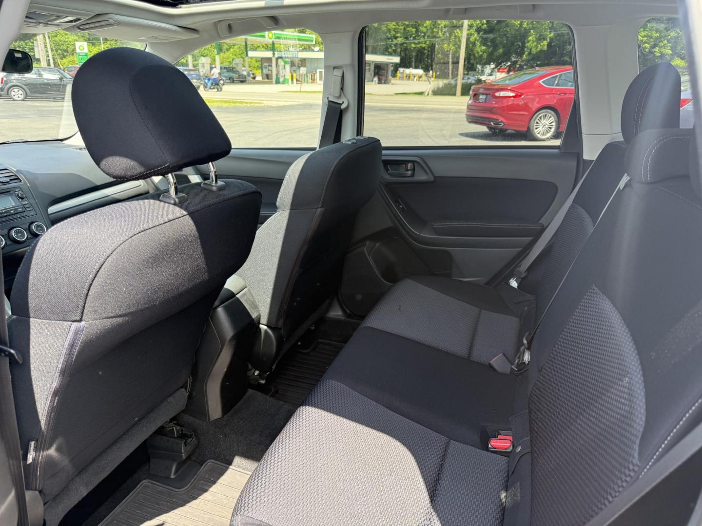 2015 Gold /Black Subaru Forester 2.5i Premium (JF2SJADC0FH) with an 2.5L H4 DOHC 16V engine, Automatic transmission, located at 11115 Chardon Rd. , Chardon, OH, 44024, (440) 214-9705, 41.580246, -81.241943 - This One Owner 2015 Subaru Forester 2.5 H4 is equipped with a 2.5-liter four-cylinder engine paired with Subaru's Symmetrical All-Wheel Drive system, offering reliable performance and stability, especially in diverse driving conditions. It boasts an impressive 31 MPG highway, making it economical fo - Photo#22