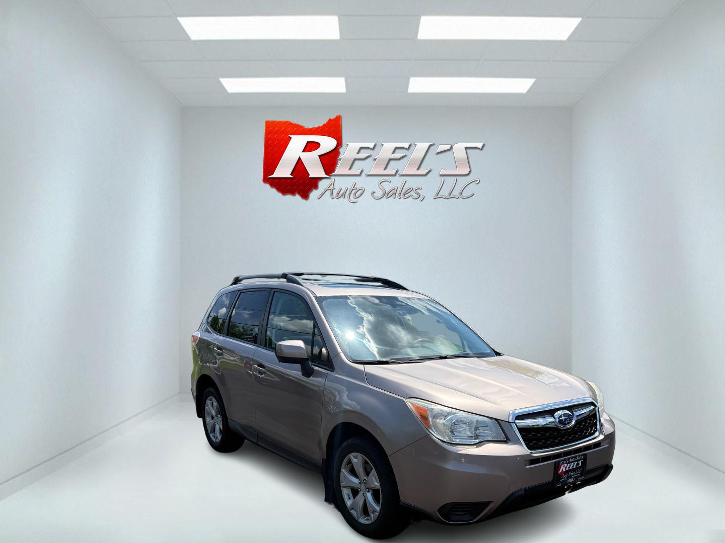 2015 Gold /Black Subaru Forester 2.5i Premium (JF2SJADC0FH) with an 2.5L H4 DOHC 16V engine, Automatic transmission, located at 11115 Chardon Rd. , Chardon, OH, 44024, (440) 214-9705, 41.580246, -81.241943 - This One Owner 2015 Subaru Forester 2.5 H4 is equipped with a 2.5-liter four-cylinder engine paired with Subaru's Symmetrical All-Wheel Drive system, offering reliable performance and stability, especially in diverse driving conditions. It boasts an impressive 31 MPG highway, making it economical fo - Photo#2