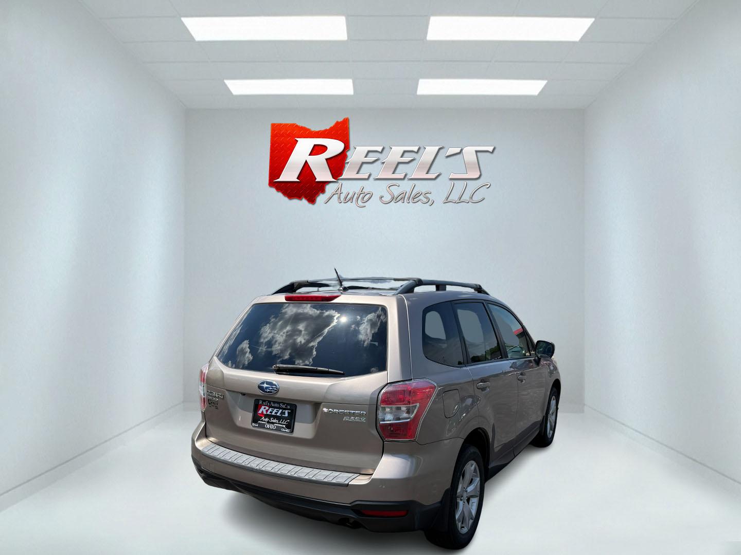 2015 Gold /Black Subaru Forester 2.5i Premium (JF2SJADC0FH) with an 2.5L H4 DOHC 16V engine, Automatic transmission, located at 11115 Chardon Rd. , Chardon, OH, 44024, (440) 214-9705, 41.580246, -81.241943 - This One Owner 2015 Subaru Forester 2.5 H4 is equipped with a 2.5-liter four-cylinder engine paired with Subaru's Symmetrical All-Wheel Drive system, offering reliable performance and stability, especially in diverse driving conditions. It boasts an impressive 31 MPG highway, making it economical fo - Photo#35