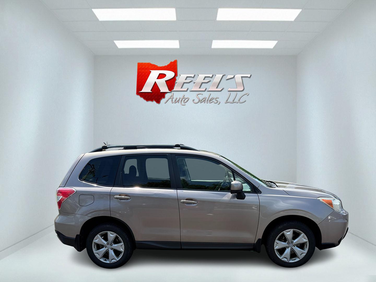 2015 Gold /Black Subaru Forester 2.5i Premium (JF2SJADC0FH) with an 2.5L H4 DOHC 16V engine, Automatic transmission, located at 11115 Chardon Rd. , Chardon, OH, 44024, (440) 214-9705, 41.580246, -81.241943 - This One Owner 2015 Subaru Forester 2.5 H4 is equipped with a 2.5-liter four-cylinder engine paired with Subaru's Symmetrical All-Wheel Drive system, offering reliable performance and stability, especially in diverse driving conditions. It boasts an impressive 31 MPG highway, making it economical fo - Photo#34