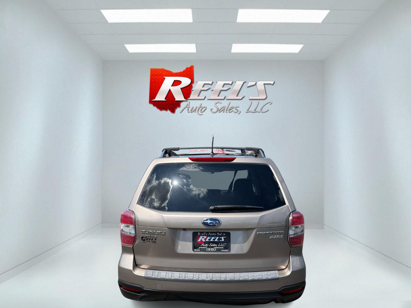 2015 Gold /Black Subaru Forester 2.5i Premium (JF2SJADC0FH) with an 2.5L H4 DOHC 16V engine, Automatic transmission, located at 11115 Chardon Rd. , Chardon, OH, 44024, (440) 214-9705, 41.580246, -81.241943 - This One Owner 2015 Subaru Forester 2.5 H4 is equipped with a 2.5-liter four-cylinder engine paired with Subaru's Symmetrical All-Wheel Drive system, offering reliable performance and stability, especially in diverse driving conditions. It boasts an impressive 31 MPG highway, making it economical fo - Photo#36