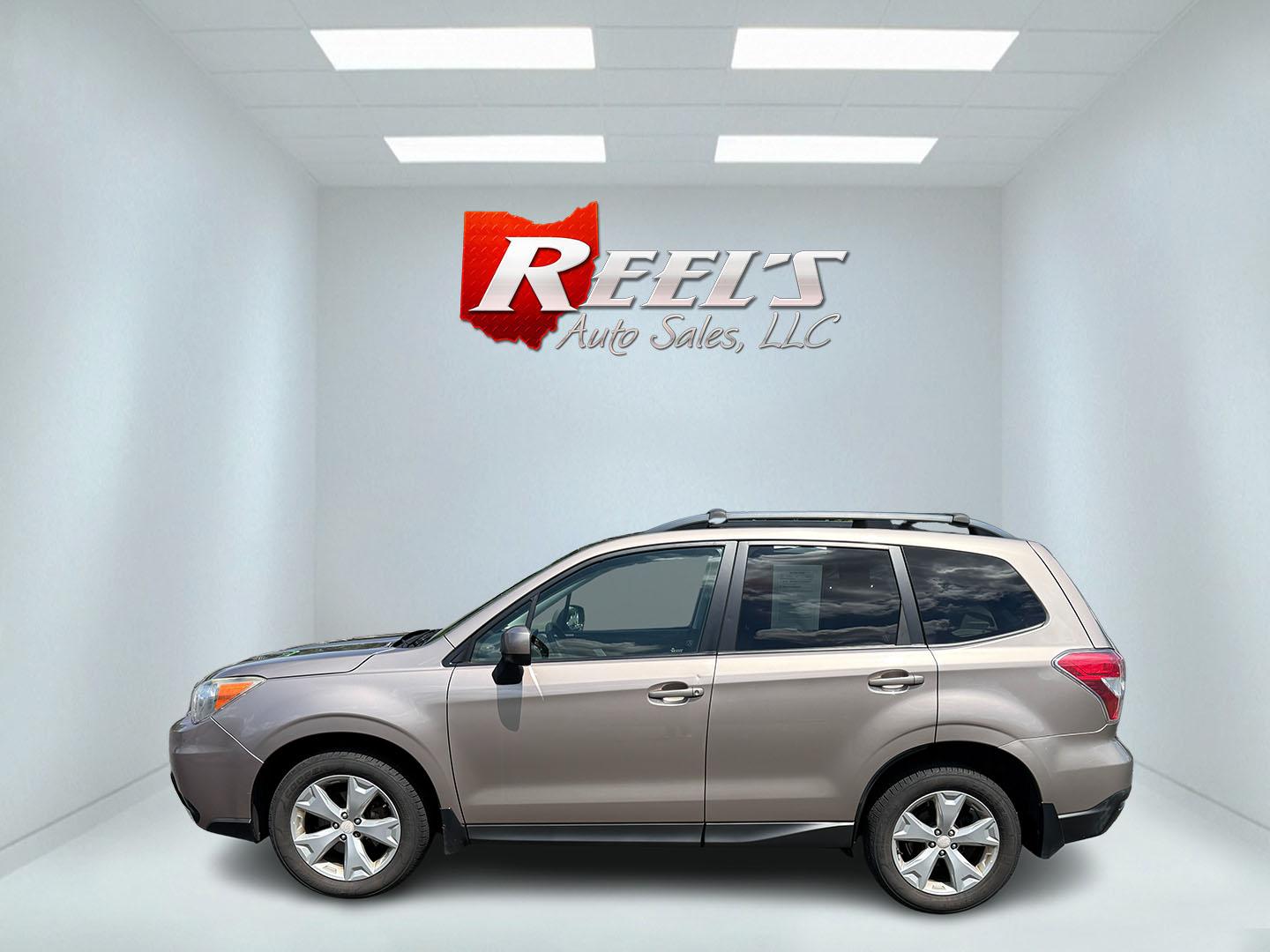 2015 Gold /Black Subaru Forester 2.5i Premium (JF2SJADC0FH) with an 2.5L H4 DOHC 16V engine, Automatic transmission, located at 11115 Chardon Rd. , Chardon, OH, 44024, (440) 214-9705, 41.580246, -81.241943 - This One Owner 2015 Subaru Forester 2.5 H4 is equipped with a 2.5-liter four-cylinder engine paired with Subaru's Symmetrical All-Wheel Drive system, offering reliable performance and stability, especially in diverse driving conditions. It boasts an impressive 31 MPG highway, making it economical fo - Photo#38