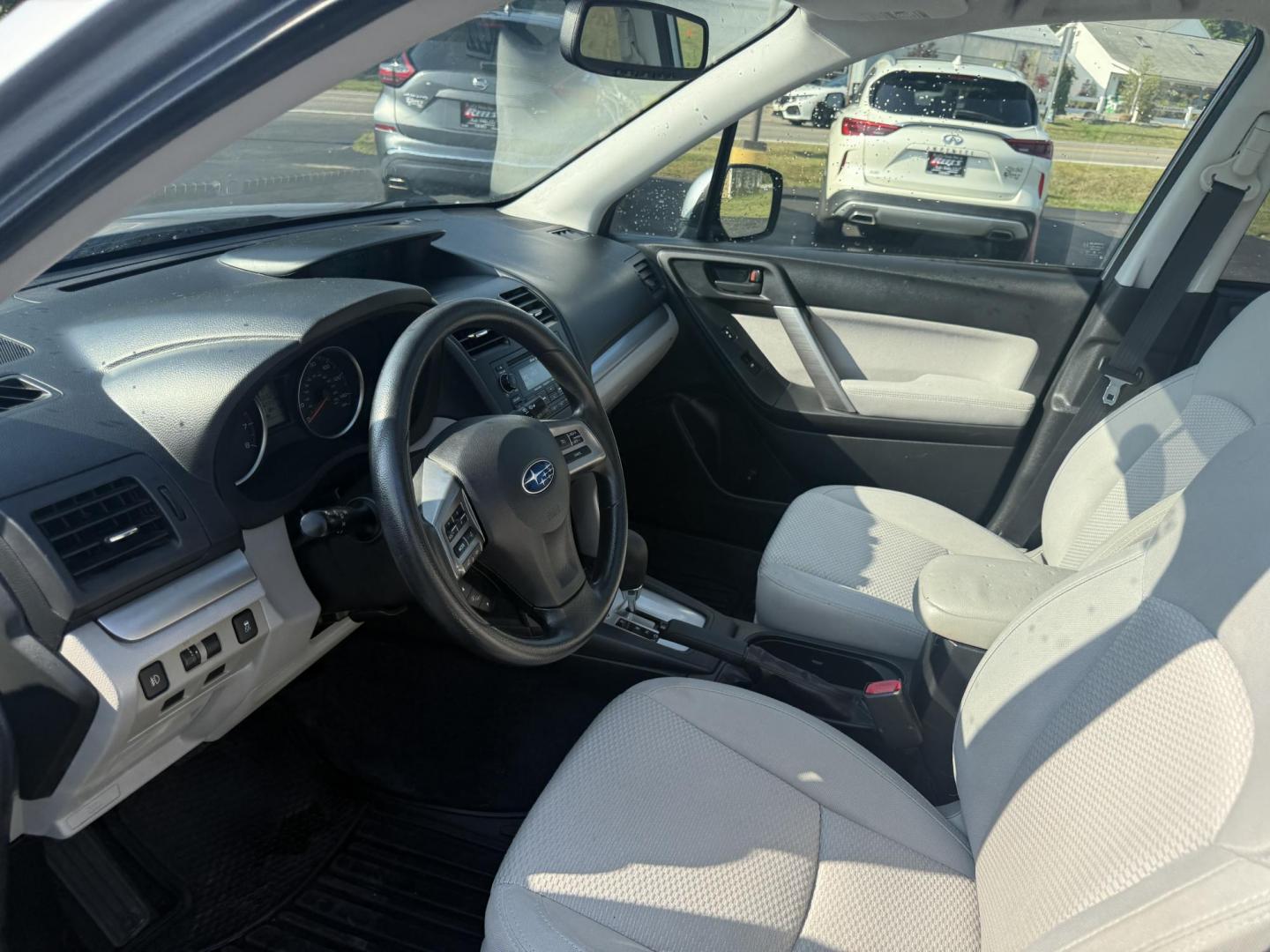 2014 Silver /Gray Subaru Forester 2.5i Premium (JF2SJAEC7EH) with an 2.5L H4 DOHC 16V engine, Automatic transmission, located at 547 E. Main St., Orwell, OH, 44076, (440) 437-5893, 41.535435, -80.847855 - Fresh Local Purchase ----- This 2014 Subaru Forester 2.5i Premium features a 2.5-liter four-cylinder H4 engine paired with Subaru's Symmetrical AWD system, delivering dependable performance and excellent stability across various terrains. It achieves an impressive 31 MPG highway, making it fuel-effi - Photo#8
