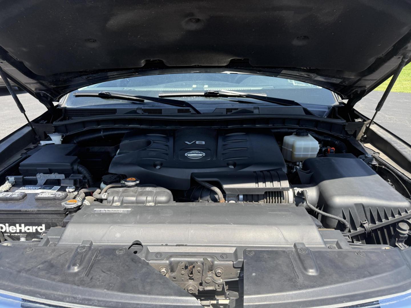 2017 Black /Black Nissan Armada SV AWD (JN8AY2NC4H9) with an 5.6L V8 DOHC 32V engine, 7A transmission, located at 547 E. Main St., Orwell, OH, 44076, (440) 437-5893, 41.535435, -80.847855 - The 2017 Nissan Armada SV 4WD is a full-size SUV powered by a robust 5.6-liter Endurance V8 engine producing 390 hp and 394 lb-ft of torque, paired with a 7-speed automatic transmission and offering an impressive 8,500-pound towing capacity. It boasts comfort and convenience features like 8-way powe - Photo#3