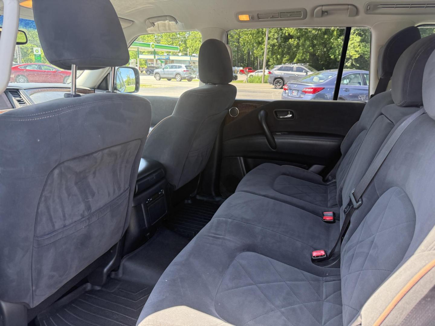2017 Black /Black Nissan Armada SV AWD (JN8AY2NC4H9) with an 5.6L V8 DOHC 32V engine, 7A transmission, located at 547 E. Main St., Orwell, OH, 44076, (440) 437-5893, 41.535435, -80.847855 - The 2017 Nissan Armada SV 4WD is a full-size SUV powered by a robust 5.6-liter Endurance V8 engine producing 390 hp and 394 lb-ft of torque, paired with a 7-speed automatic transmission and offering an impressive 8,500-pound towing capacity. It boasts comfort and convenience features like 8-way powe - Photo#27