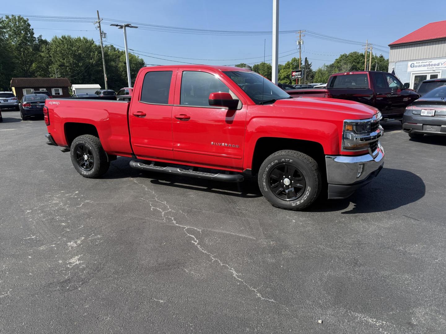2017 Red /Black Chevrolet Silverado 1500 LT Double Cab 4WD (1GCVKREH4HZ) with an 4.3L V6 OHV 12V FFV engine, 6 Speed Automatic transmission, located at 547 E. Main St., Orwell, OH, 44076, (440) 437-5893, 41.535435, -80.847855 - This 2017 Chevrolet Silverado 1500 LT Double Cab is a capable full-size pickup powered by a 4.3L V8 engine paired with a 6-speed automatic transmission, featuring a G80 locking rear differential and 3.42 gearing for strong performance and a 7,100-pound towing capacity. Flex-fuel capability, LED day - Photo#3