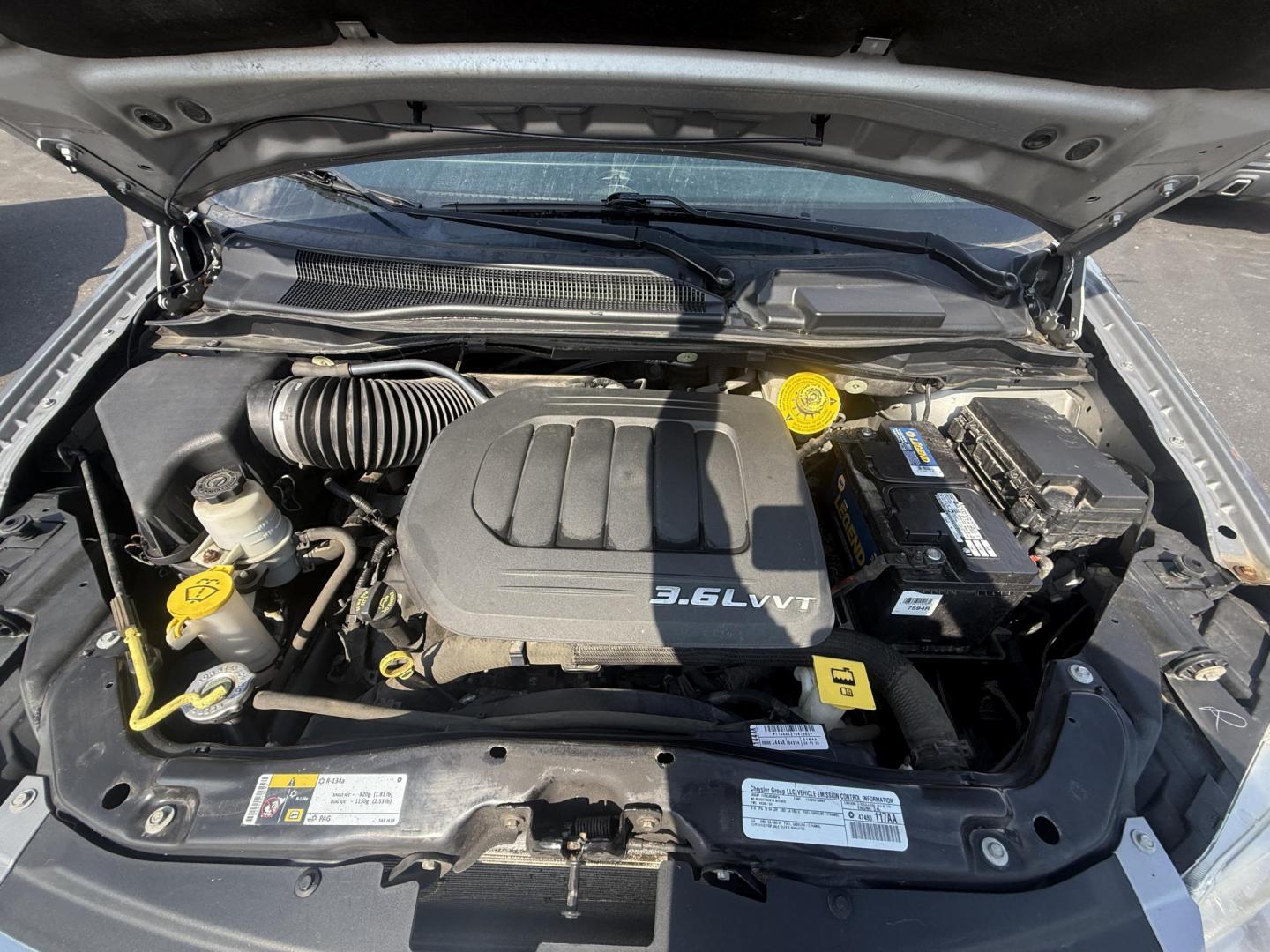 2015 Silver /Black Chrysler Town & Country Touring (2C4RC1BG7FR) with an 3.6L V6 DOHC 24V FFV engine, 6-Speed Automatic transmission, located at 547 E. Main St., Orwell, OH, 44076, (440) 437-5893, 41.535435, -80.847855 - Photo#3