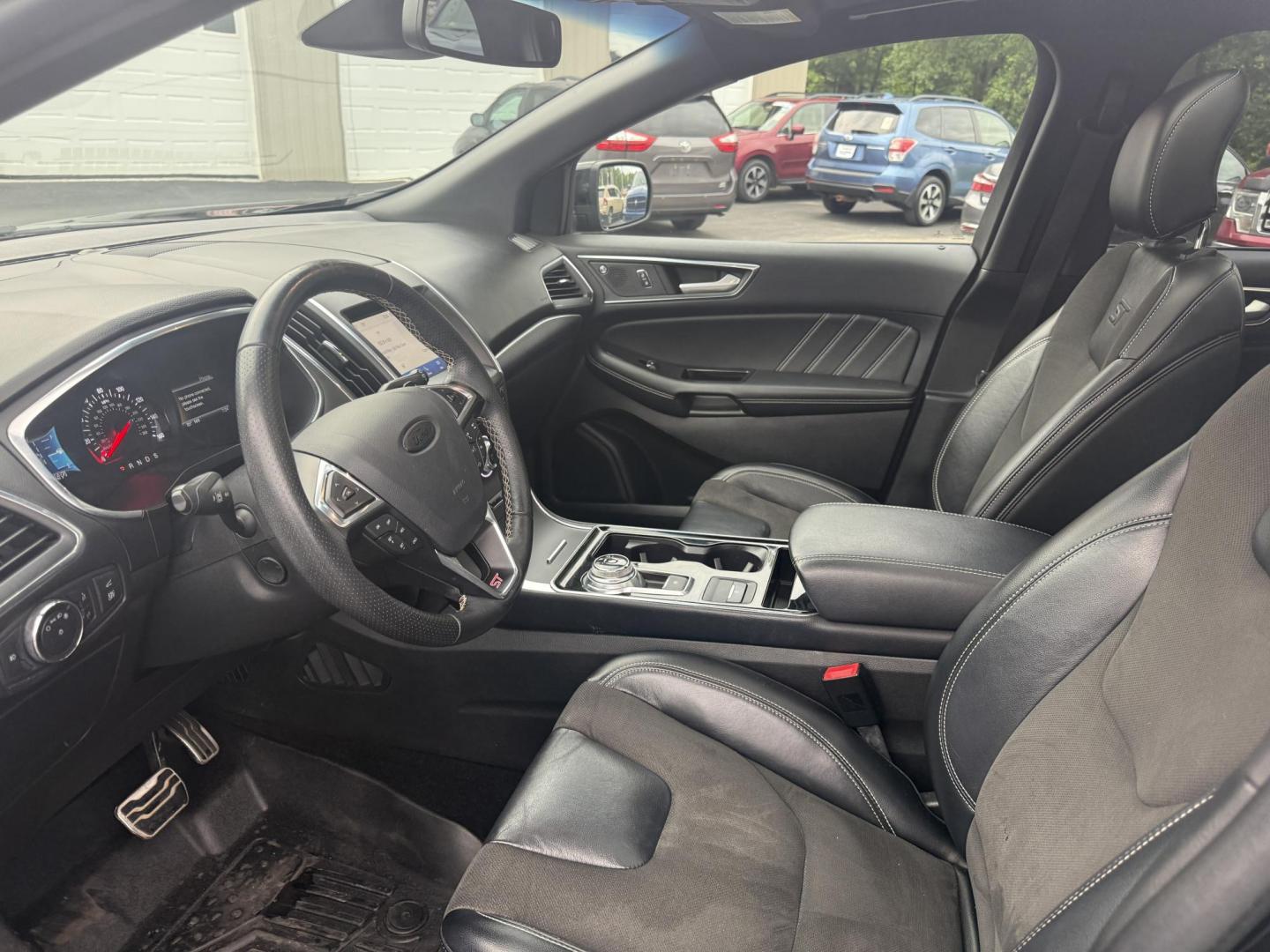2019 Black /Black Ford Edge ST AWD (2FMPK4AP7KB) with an 2.7L V6 DOCH 24V Twin Turbo engine, 8-Speed Automatic transmission, located at 547 E. Main St., Orwell, OH, 44076, (440) 437-5893, 41.535435, -80.847855 - This 2019 Ford Edge ST AWD is a sporty midsize SUV featuring a 2.7L twin-turbo EcoBoost V6 engine paired with a 8-speed automatic transmission, delivering a robust 0-60 mph time of 5.7 seconds. Inside, it boasts leather and suede heated power front seats, a 12-speaker B&O sound system, an 8-inch tou - Photo#9