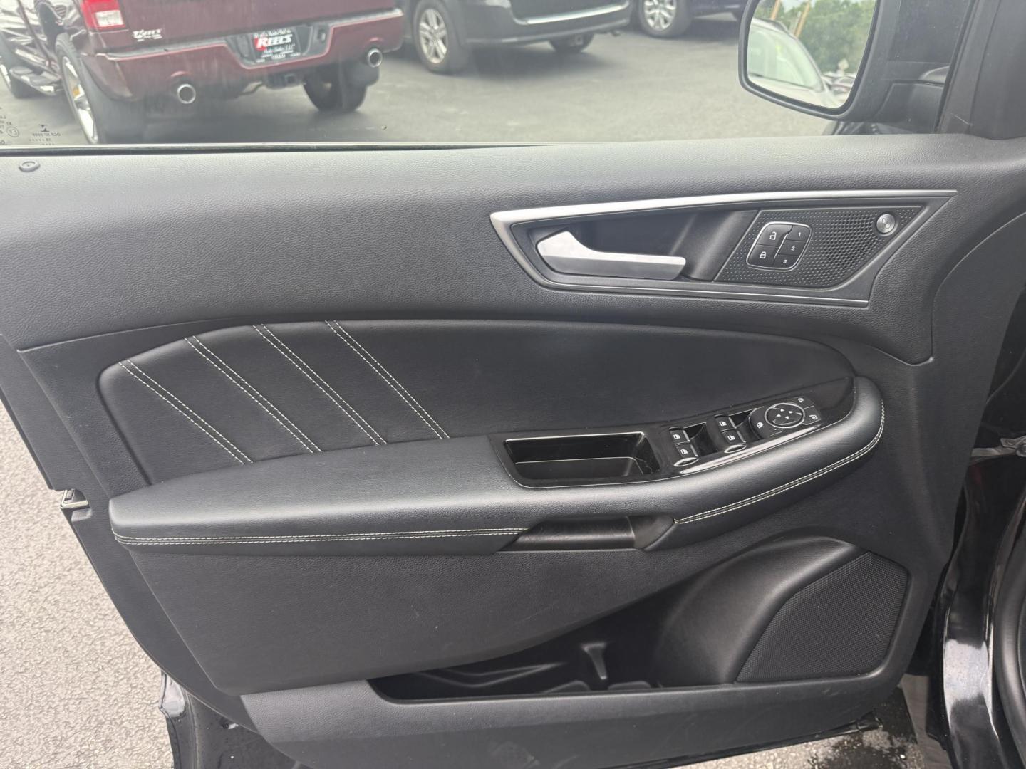 2019 Black /Black Ford Edge ST AWD (2FMPK4AP7KB) with an 2.7L V6 DOCH 24V Twin Turbo engine, 8-Speed Automatic transmission, located at 547 E. Main St., Orwell, OH, 44076, (440) 437-5893, 41.535435, -80.847855 - This 2019 Ford Edge ST AWD is a sporty midsize SUV featuring a 2.7L twin-turbo EcoBoost V6 engine paired with a 8-speed automatic transmission, delivering a robust 0-60 mph time of 5.7 seconds. Inside, it boasts leather and suede heated power front seats, a 12-speaker B&O sound system, an 8-inch tou - Photo#10