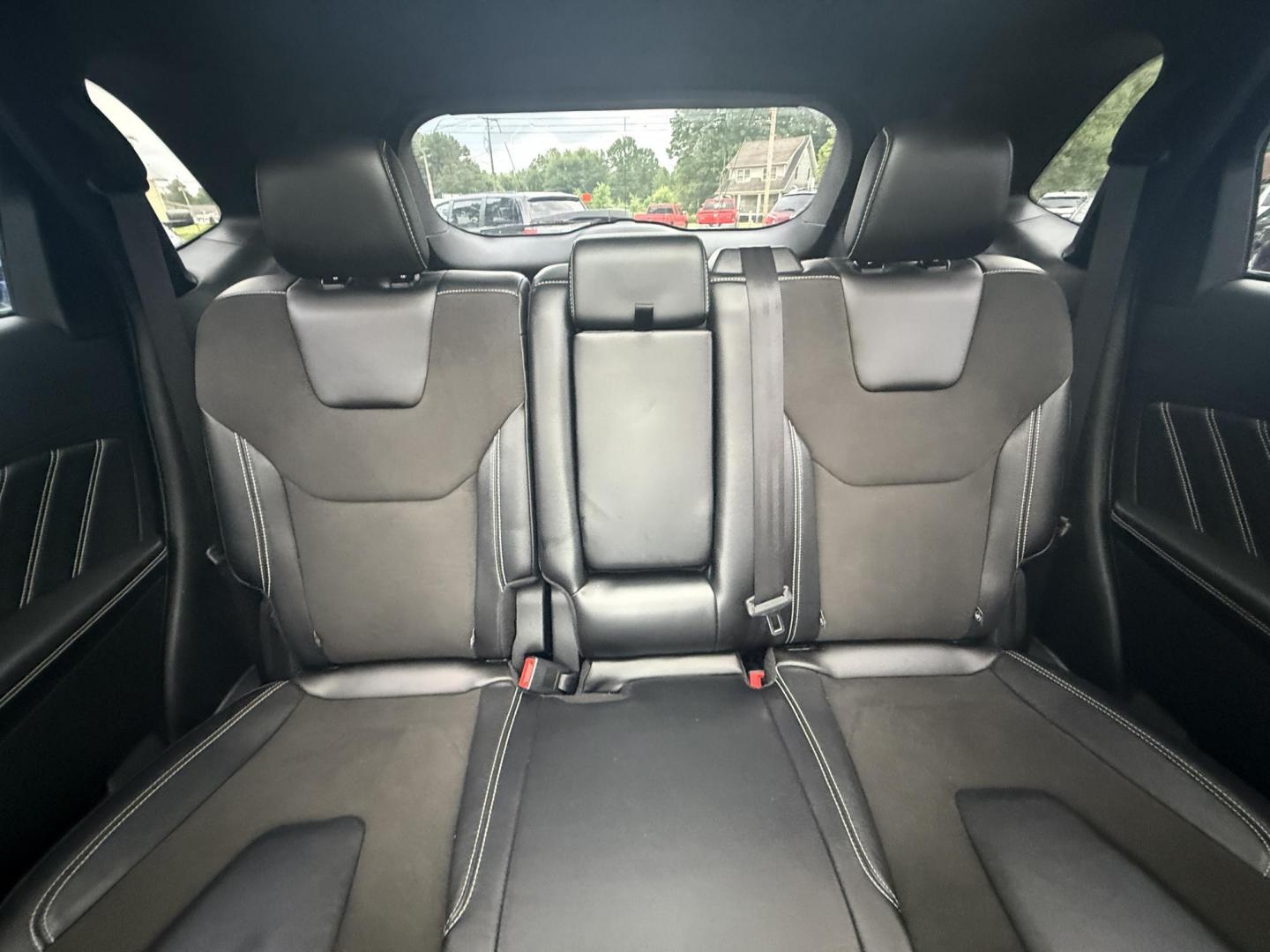 2019 Black /Black Ford Edge ST AWD (2FMPK4AP7KB) with an 2.7L V6 DOCH 24V Twin Turbo engine, 8-Speed Automatic transmission, located at 547 E. Main St., Orwell, OH, 44076, (440) 437-5893, 41.535435, -80.847855 - This 2019 Ford Edge ST AWD is a sporty midsize SUV featuring a 2.7L twin-turbo EcoBoost V6 engine paired with a 8-speed automatic transmission, delivering a robust 0-60 mph time of 5.7 seconds. Inside, it boasts leather and suede heated power front seats, a 12-speaker B&O sound system, an 8-inch tou - Photo#28