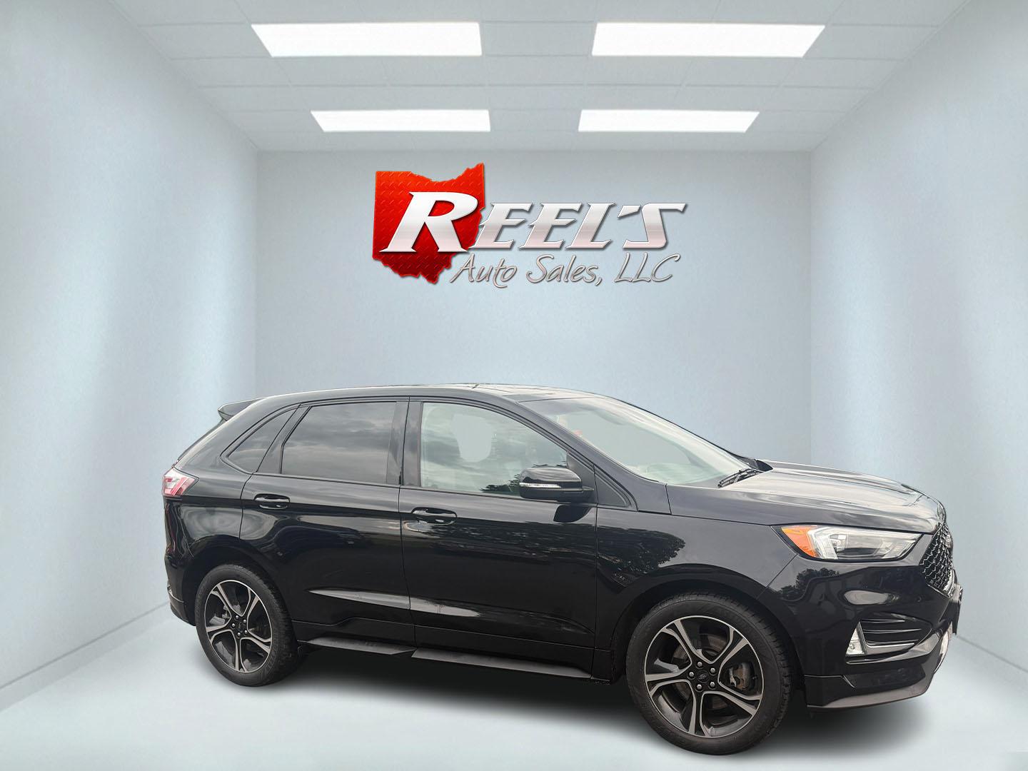 2019 Black /Black Ford Edge ST AWD (2FMPK4AP7KB) with an 2.7L V6 DOCH 24V Twin Turbo engine, 8-Speed Automatic transmission, located at 547 E. Main St., Orwell, OH, 44076, (440) 437-5893, 41.535435, -80.847855 - This 2019 Ford Edge ST AWD is a sporty midsize SUV featuring a 2.7L twin-turbo EcoBoost V6 engine paired with a 8-speed automatic transmission, delivering a robust 0-60 mph time of 5.7 seconds. Inside, it boasts leather and suede heated power front seats, a 12-speaker B&O sound system, an 8-inch tou - Photo#45