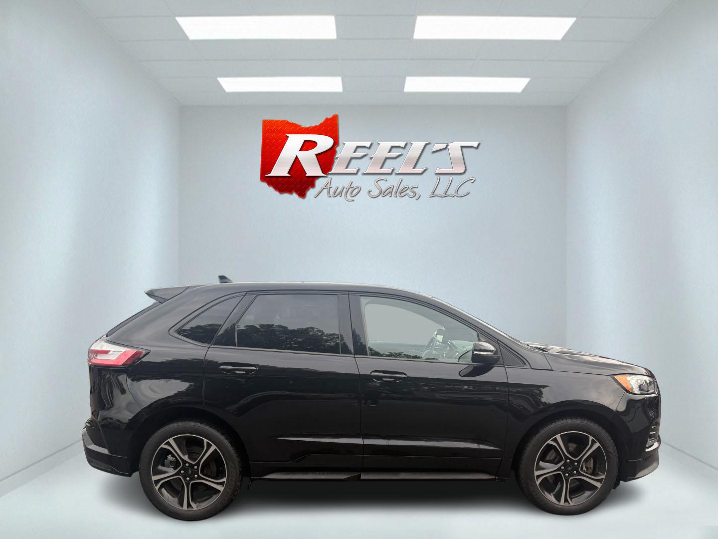 2019 Black /Black Ford Edge ST AWD (2FMPK4AP7KB) with an 2.7L V6 DOCH 24V Twin Turbo engine, 8-Speed Automatic transmission, located at 547 E. Main St., Orwell, OH, 44076, (440) 437-5893, 41.535435, -80.847855 - This 2019 Ford Edge ST AWD is a sporty midsize SUV featuring a 2.7L twin-turbo EcoBoost V6 engine paired with a 8-speed automatic transmission, delivering a robust 0-60 mph time of 5.7 seconds. Inside, it boasts leather and suede heated power front seats, a 12-speaker B&O sound system, an 8-inch tou - Photo#46