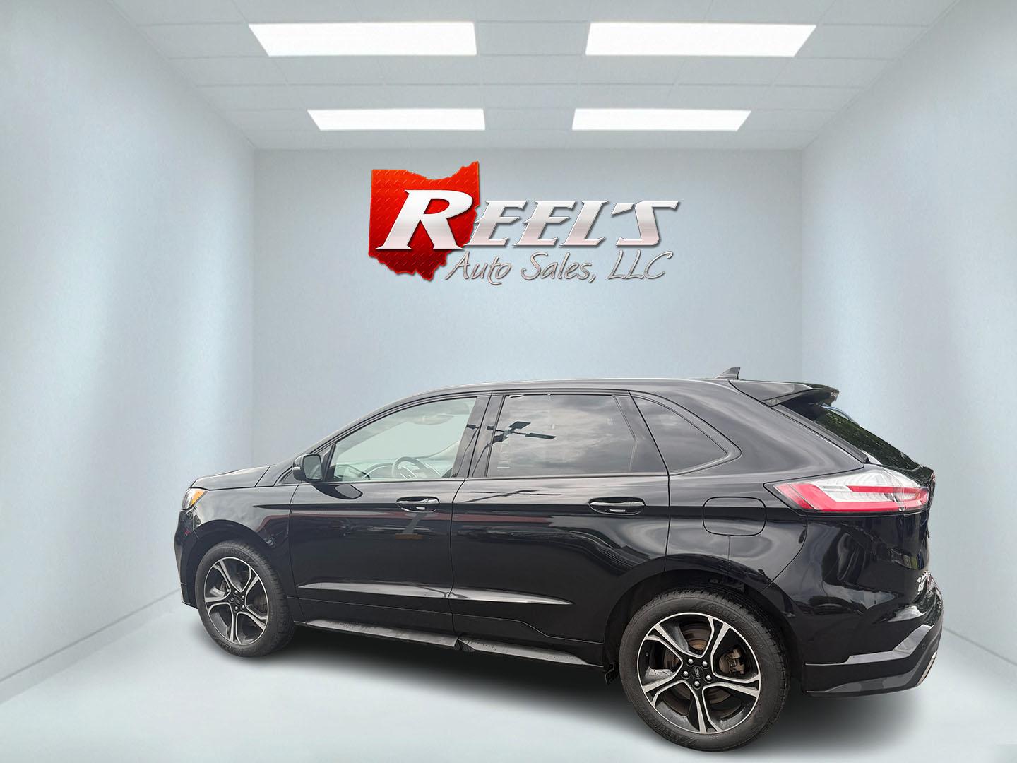 2019 Black /Black Ford Edge ST AWD (2FMPK4AP7KB) with an 2.7L V6 DOCH 24V Twin Turbo engine, 8-Speed Automatic transmission, located at 547 E. Main St., Orwell, OH, 44076, (440) 437-5893, 41.535435, -80.847855 - This 2019 Ford Edge ST AWD is a sporty midsize SUV featuring a 2.7L twin-turbo EcoBoost V6 engine paired with a 8-speed automatic transmission, delivering a robust 0-60 mph time of 5.7 seconds. Inside, it boasts leather and suede heated power front seats, a 12-speaker B&O sound system, an 8-inch tou - Photo#50