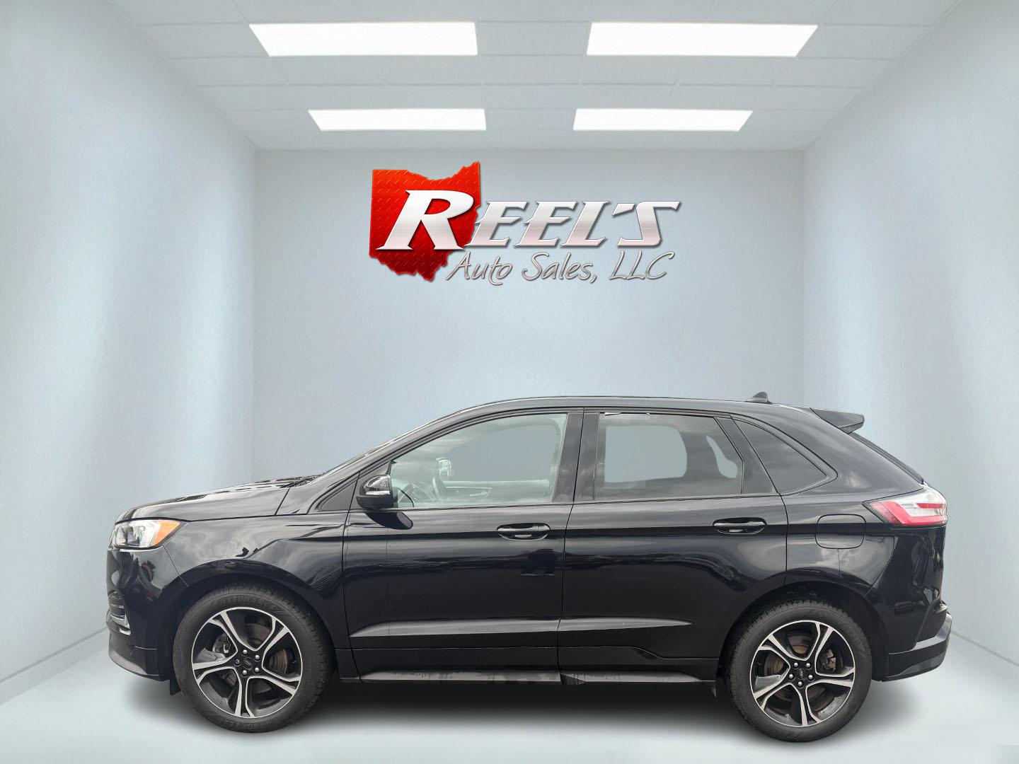 2019 Black /Black Ford Edge ST AWD (2FMPK4AP7KB) with an 2.7L V6 DOCH 24V Twin Turbo engine, 8-Speed Automatic transmission, located at 547 E. Main St., Orwell, OH, 44076, (440) 437-5893, 41.535435, -80.847855 - This 2019 Ford Edge ST AWD is a sporty midsize SUV featuring a 2.7L twin-turbo EcoBoost V6 engine paired with a 8-speed automatic transmission, delivering a robust 0-60 mph time of 5.7 seconds. Inside, it boasts leather and suede heated power front seats, a 12-speaker B&O sound system, an 8-inch tou - Photo#51