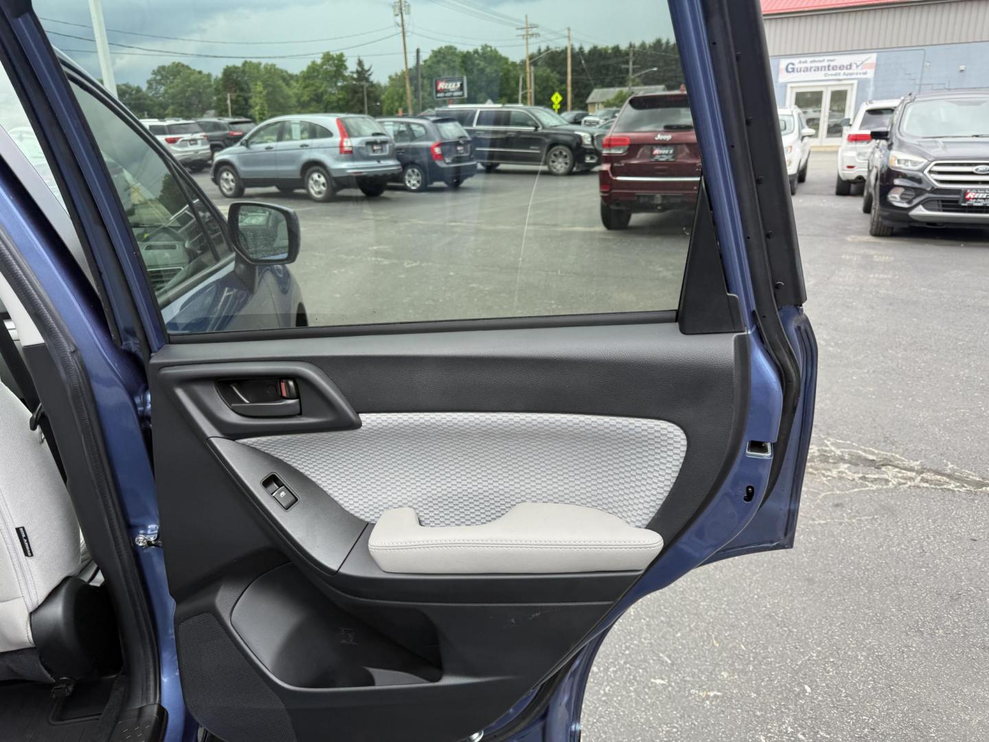 2018 Blue /Gray Subaru Forester 2.5i Premium PZEV CVT (JF2SJAGC3JH) with an 2.5L H4 DOHC 16V engine, Automatic transmission, located at 547 E. Main St., Orwell, OH, 44076, (440) 437-5893, 41.535435, -80.847855 - This well equipped One Owner 2018 Subaru Forester 2.5i Premium features the efficient 2.5-liter H4 engine, Symmetrical AWD with X-Mode, and an impressive 32 MPG highway rating; highlights include EyeSight Driver-Assist, Blind-Spot Monitoring with Rear Cross-Traffic Alert, remote start, heated front - Photo#28