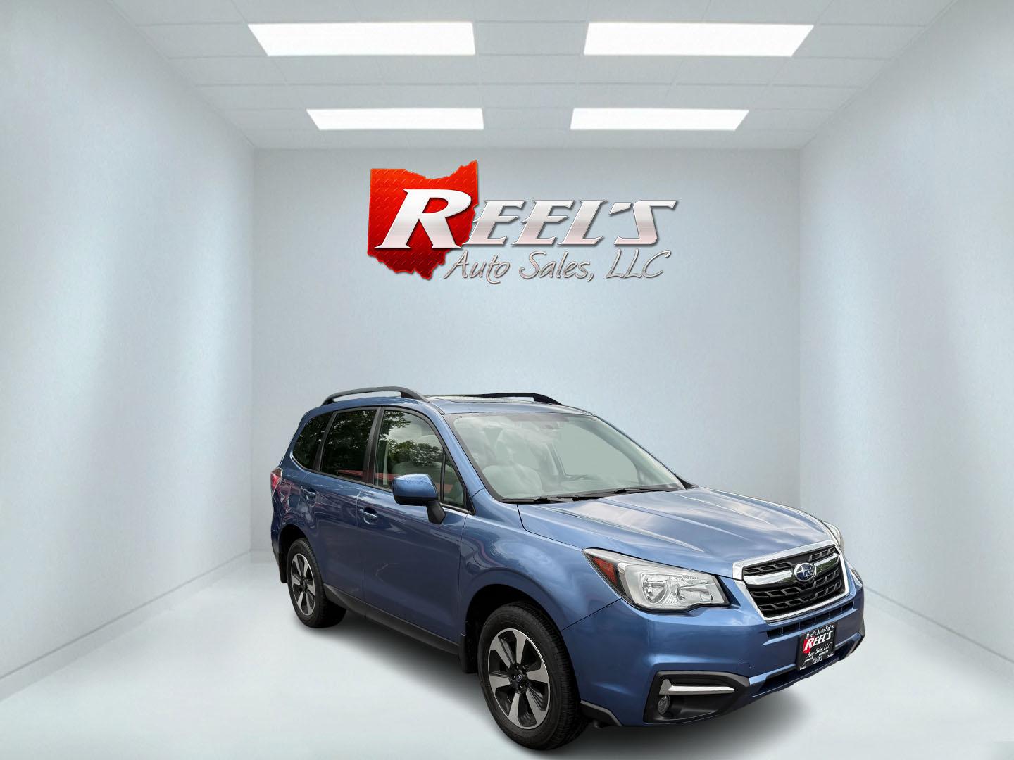 2018 Blue /Gray Subaru Forester 2.5i Premium PZEV CVT (JF2SJAGC3JH) with an 2.5L H4 DOHC 16V engine, Automatic transmission, located at 547 E. Main St., Orwell, OH, 44076, (440) 437-5893, 41.535435, -80.847855 - This well equipped One Owner 2018 Subaru Forester 2.5i Premium features the efficient 2.5-liter H4 engine, Symmetrical AWD with X-Mode, and an impressive 32 MPG highway rating; highlights include EyeSight Driver-Assist, Blind-Spot Monitoring with Rear Cross-Traffic Alert, remote start, heated front - Photo#2