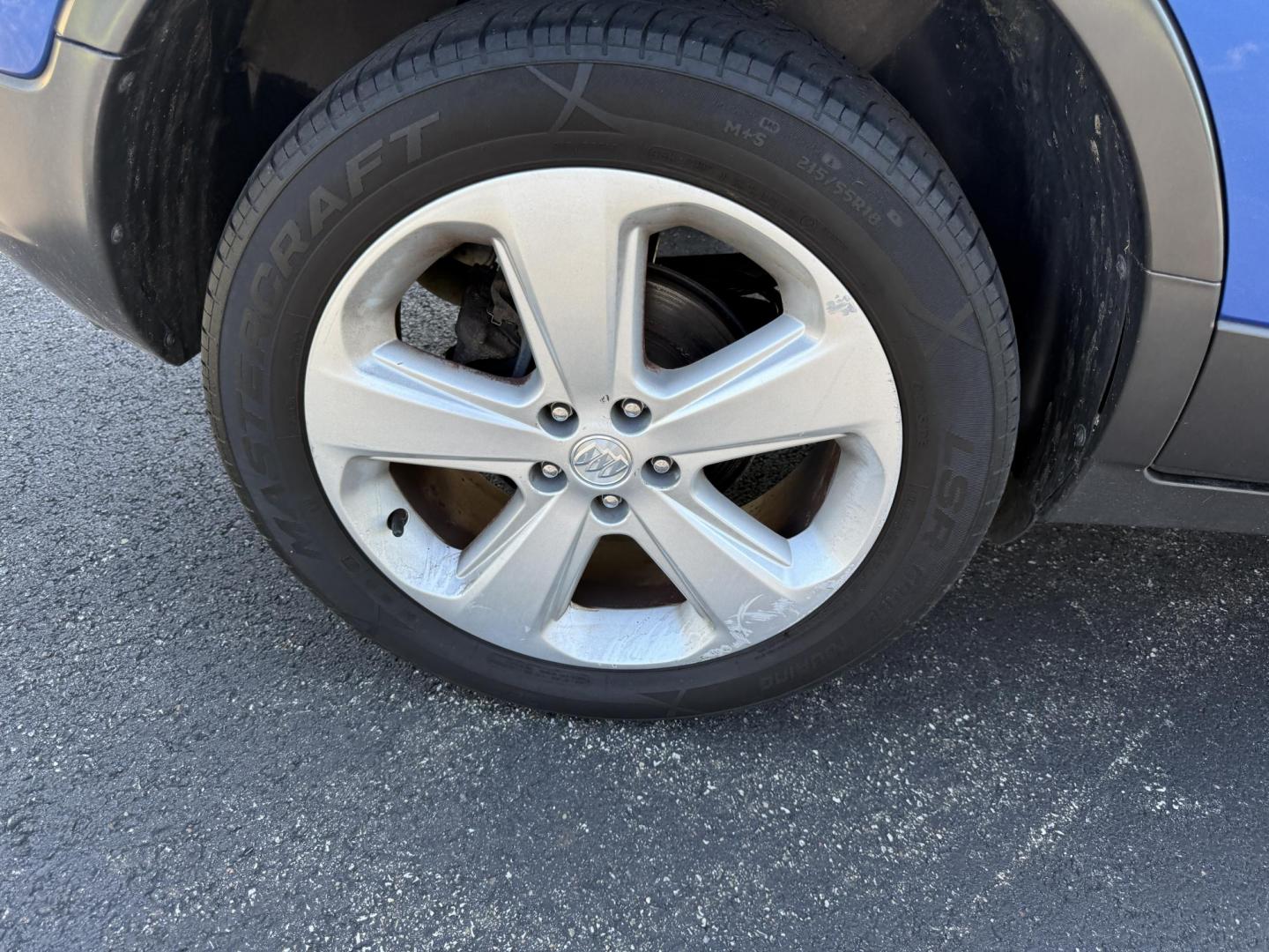 2015 Blue /Gray Buick Encore Leather AWD (KL4CJGSB8FB) with an 1.4L I4 DOHC 16V TURBO engine, 6A transmission, located at 11115 Chardon Rd. , Chardon, OH, 44024, (440) 214-9705, 41.580246, -81.241943 - The 2015 Buick Encore Leather AWD is a compact SUV featuring a 1.4L turbocharged I4 EcoTec engine paired with a 6-speed automatic transmission, offering a balance of power and efficiency at an estimated 30 MPG highway. This model boasts a premium leather interior with power-adjustable, heated front - Photo#4