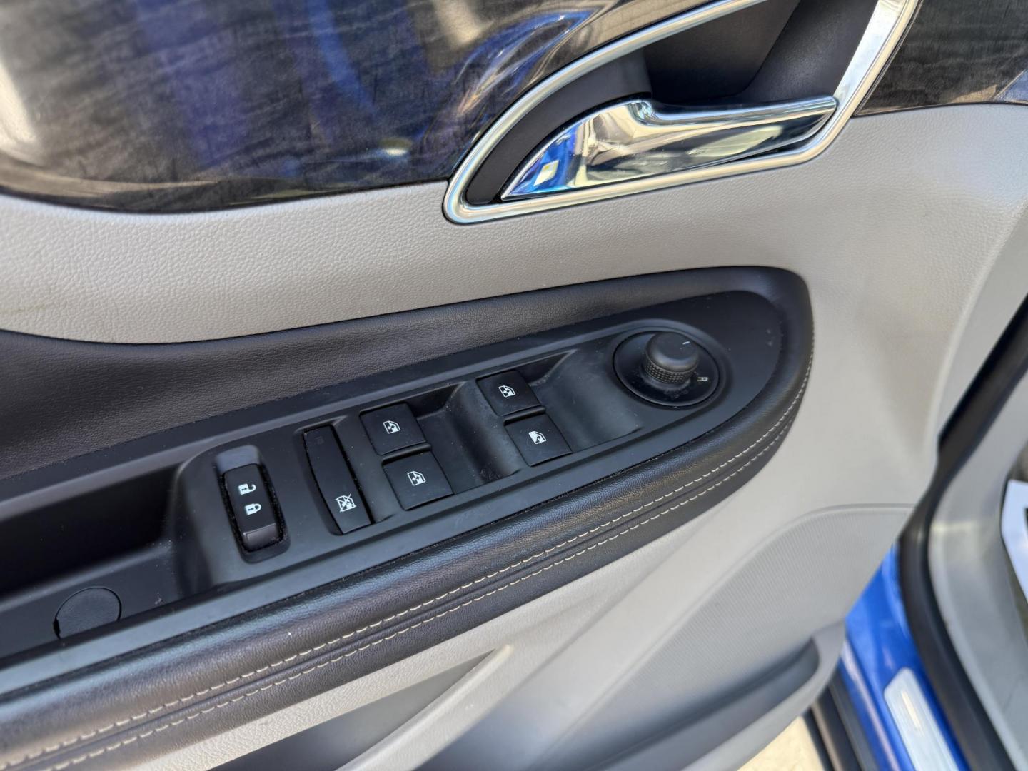 2015 Blue /Gray Buick Encore Leather AWD (KL4CJGSB8FB) with an 1.4L I4 DOHC 16V TURBO engine, 6A transmission, located at 11115 Chardon Rd. , Chardon, OH, 44024, (440) 214-9705, 41.580246, -81.241943 - The 2015 Buick Encore Leather AWD is a compact SUV featuring a 1.4L turbocharged I4 EcoTec engine paired with a 6-speed automatic transmission, offering a balance of power and efficiency at an estimated 30 MPG highway. This model boasts a premium leather interior with power-adjustable, heated front - Photo#9