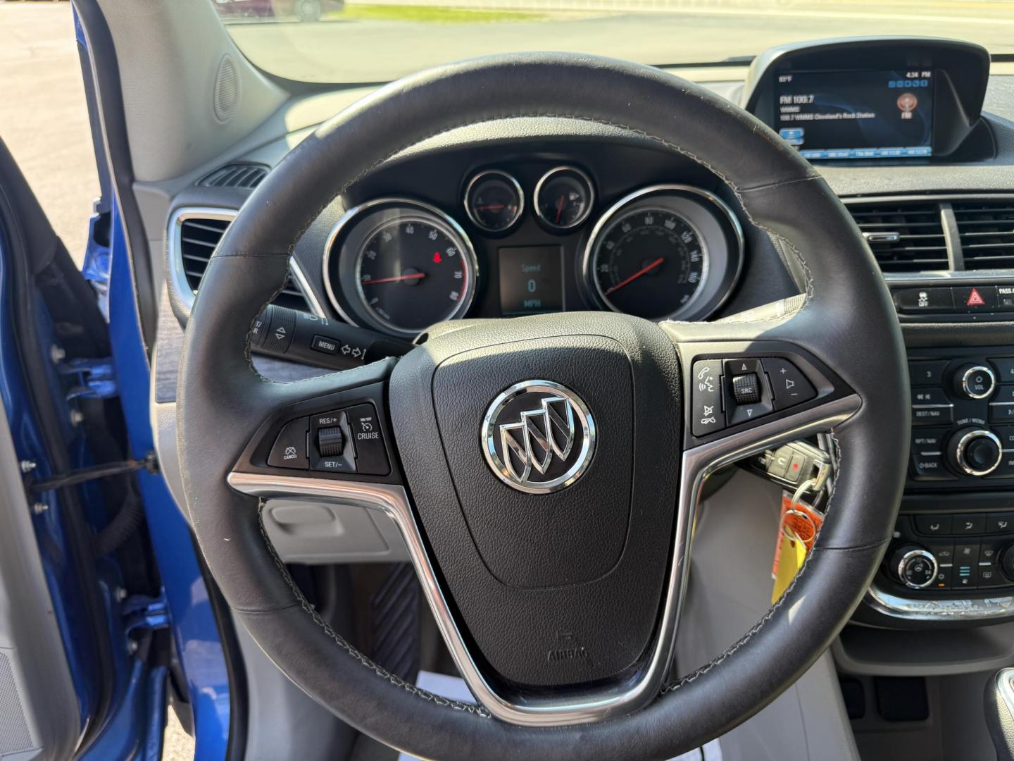 2015 Blue /Gray Buick Encore Leather AWD (KL4CJGSB8FB) with an 1.4L I4 DOHC 16V TURBO engine, 6A transmission, located at 11115 Chardon Rd. , Chardon, OH, 44024, (440) 214-9705, 41.580246, -81.241943 - The 2015 Buick Encore Leather AWD is a compact SUV featuring a 1.4L turbocharged I4 EcoTec engine paired with a 6-speed automatic transmission, offering a balance of power and efficiency at an estimated 30 MPG highway. This model boasts a premium leather interior with power-adjustable, heated front - Photo#15