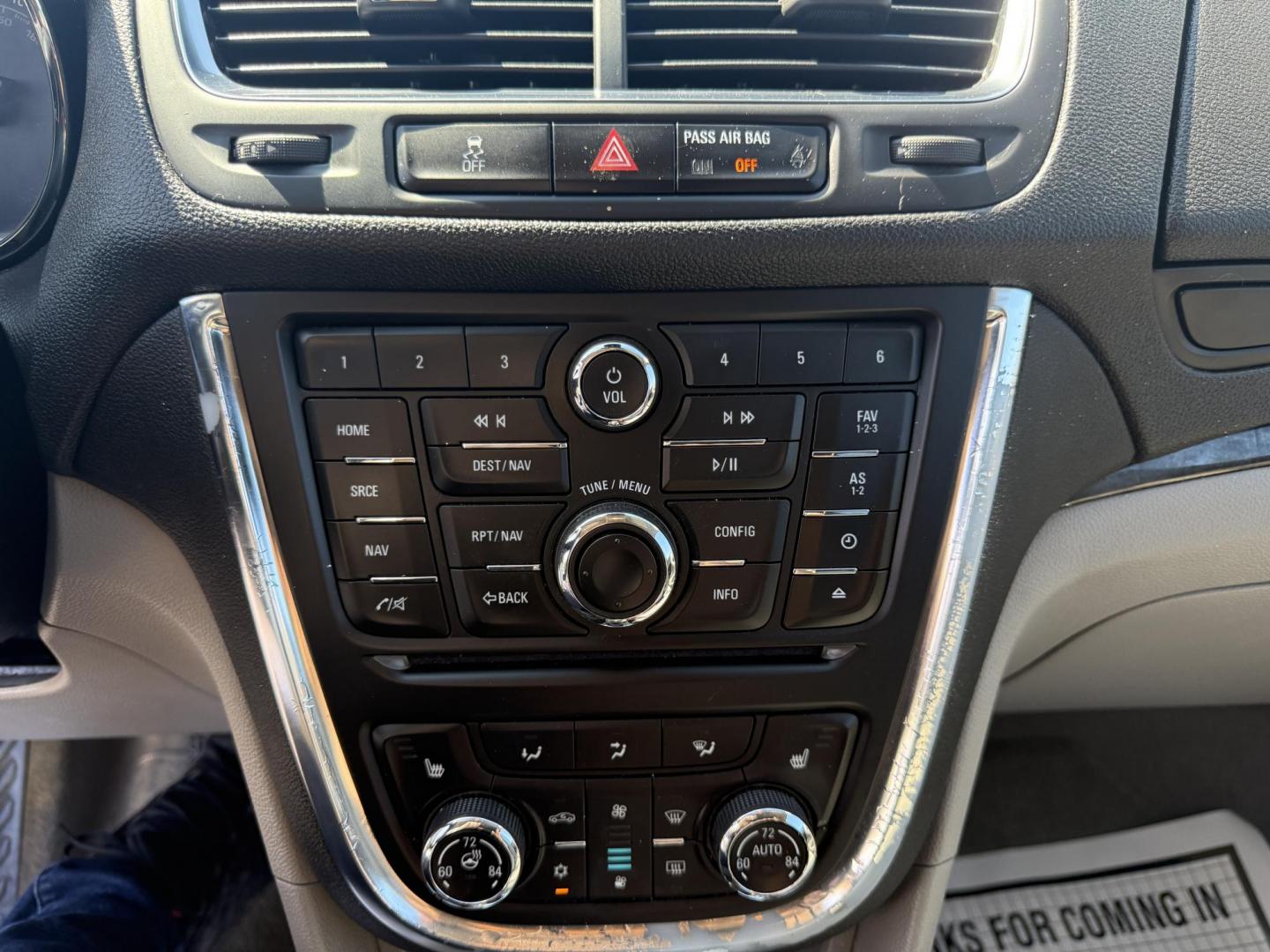 2015 Blue /Gray Buick Encore Leather AWD (KL4CJGSB8FB) with an 1.4L I4 DOHC 16V TURBO engine, 6A transmission, located at 11115 Chardon Rd. , Chardon, OH, 44024, (440) 214-9705, 41.580246, -81.241943 - The 2015 Buick Encore Leather AWD is a compact SUV featuring a 1.4L turbocharged I4 EcoTec engine paired with a 6-speed automatic transmission, offering a balance of power and efficiency at an estimated 30 MPG highway. This model boasts a premium leather interior with power-adjustable, heated front - Photo#19