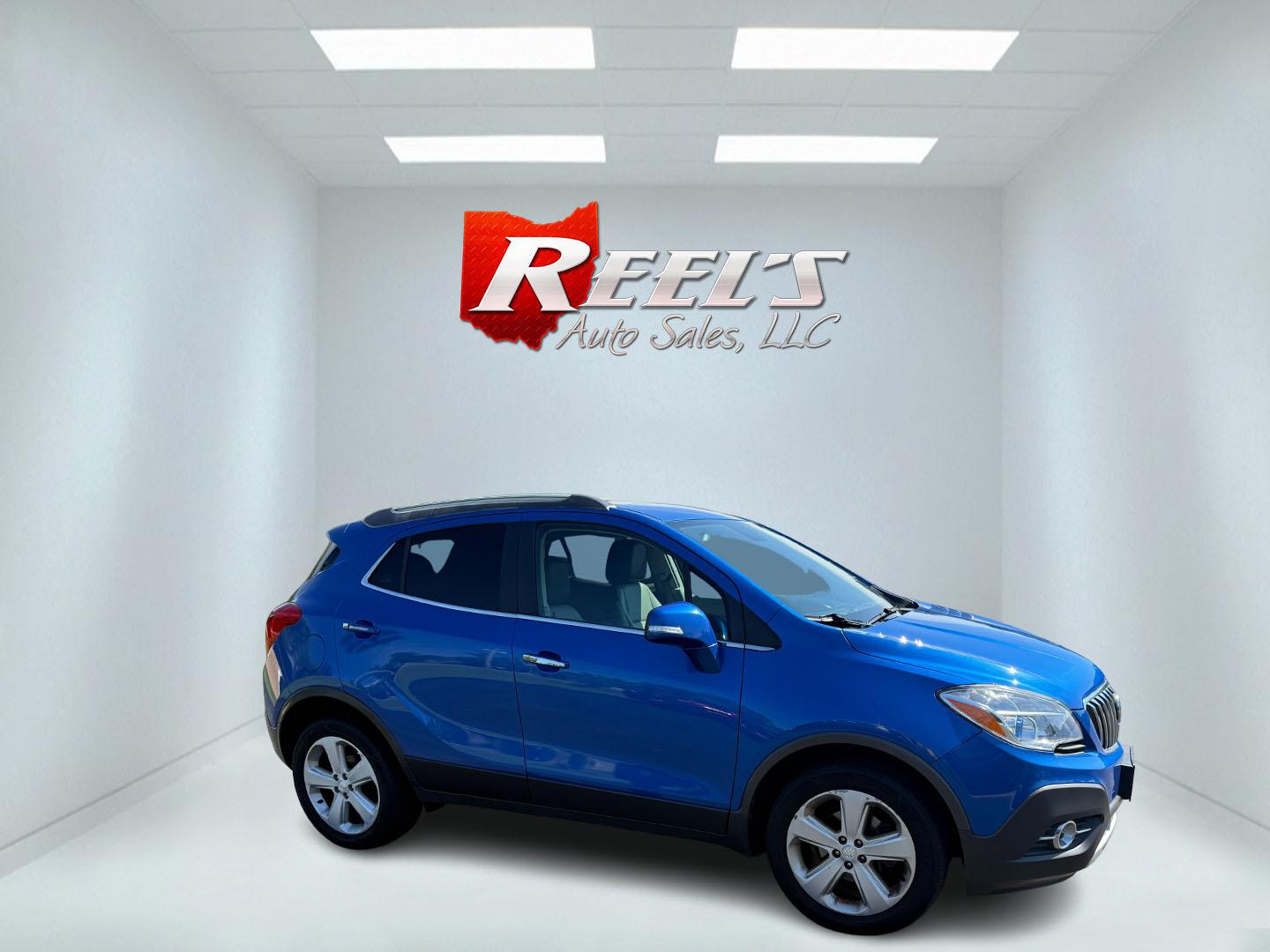 2015 Blue /Gray Buick Encore Leather AWD (KL4CJGSB8FB) with an 1.4L I4 DOHC 16V TURBO engine, 6A transmission, located at 11115 Chardon Rd. , Chardon, OH, 44024, (440) 214-9705, 41.580246, -81.241943 - The 2015 Buick Encore Leather AWD is a compact SUV featuring a 1.4L turbocharged I4 EcoTec engine paired with a 6-speed automatic transmission, offering a balance of power and efficiency at an estimated 30 MPG highway. This model boasts a premium leather interior with power-adjustable, heated front - Photo#38