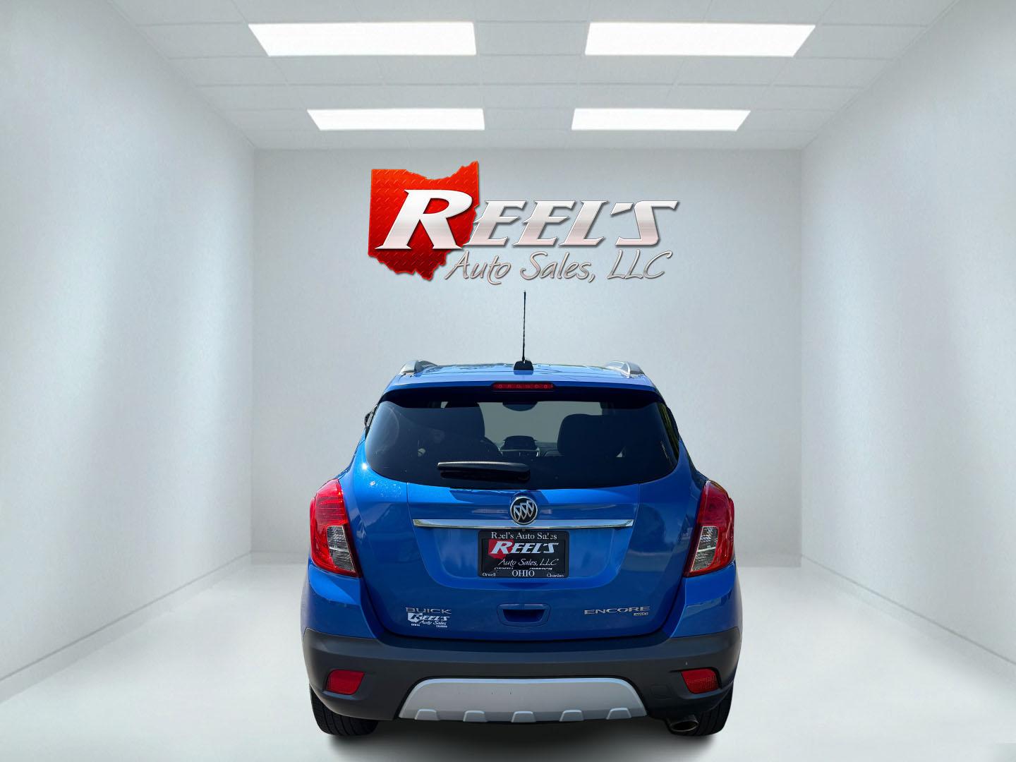 2015 Blue /Gray Buick Encore Leather AWD (KL4CJGSB8FB) with an 1.4L I4 DOHC 16V TURBO engine, 6A transmission, located at 11115 Chardon Rd. , Chardon, OH, 44024, (440) 214-9705, 41.580246, -81.241943 - The 2015 Buick Encore Leather AWD is a compact SUV featuring a 1.4L turbocharged I4 EcoTec engine paired with a 6-speed automatic transmission, offering a balance of power and efficiency at an estimated 30 MPG highway. This model boasts a premium leather interior with power-adjustable, heated front - Photo#41