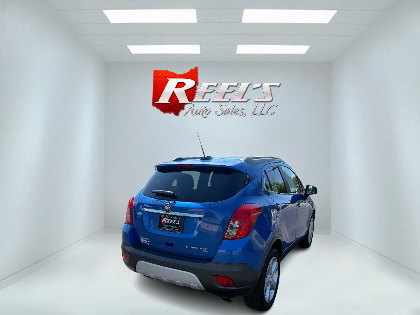 2015 Blue /Gray Buick Encore Leather AWD (KL4CJGSB8FB) with an 1.4L I4 DOHC 16V TURBO engine, 6A transmission, located at 11115 Chardon Rd. , Chardon, OH, 44024, (440) 214-9705, 41.580246, -81.241943 - The 2015 Buick Encore Leather AWD is a compact SUV featuring a 1.4L turbocharged I4 EcoTec engine paired with a 6-speed automatic transmission, offering a balance of power and efficiency at an estimated 30 MPG highway. This model boasts a premium leather interior with power-adjustable, heated front - Photo#40