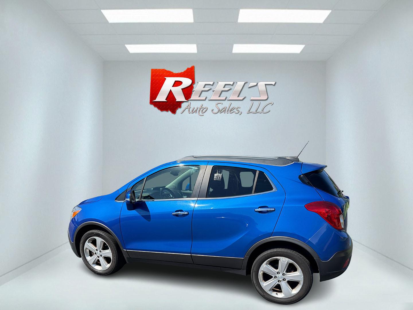 2015 Blue /Gray Buick Encore Leather AWD (KL4CJGSB8FB) with an 1.4L I4 DOHC 16V TURBO engine, 6A transmission, located at 11115 Chardon Rd. , Chardon, OH, 44024, (440) 214-9705, 41.580246, -81.241943 - The 2015 Buick Encore Leather AWD is a compact SUV featuring a 1.4L turbocharged I4 EcoTec engine paired with a 6-speed automatic transmission, offering a balance of power and efficiency at an estimated 30 MPG highway. This model boasts a premium leather interior with power-adjustable, heated front - Photo#43