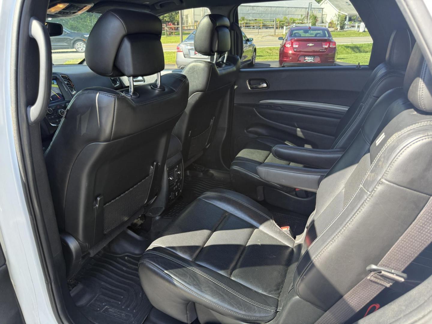2020 White /Black Dodge Durango R/T AWD (1C4SDJCT4LC) with an 5.7L V8 OHV 16V engine, 8A transmission, located at 11115 Chardon Rd. , Chardon, OH, 44024, (440) 214-9705, 41.580246, -81.241943 - This 2020 Dodge Durango R/T AWD is a powerful and well-equipped three-row SUV featuring a 5.7L HEMI V8 engine with 360 horsepower, paired with an 8-speed automatic transmission and sport suspension for dynamic performance, including a 0-60 mph time of just 6.2 seconds. It offers a robust 7,200-pound - Photo#32