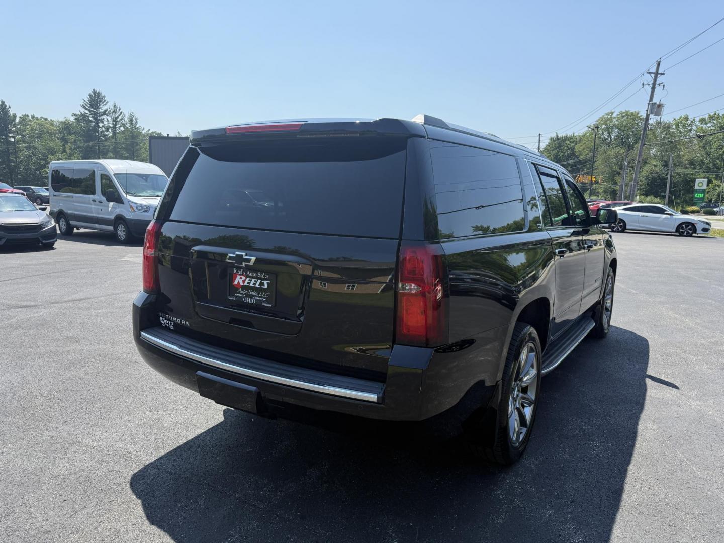 2016 Black /Black Chevrolet Suburban LTZ 4WD (1GNSKJKC6GR) with an 5.3L V8 OHV 16V engine, 6A transmission, located at 11115 Chardon Rd. , Chardon, OH, 44024, (440) 214-9705, 41.580246, -81.241943 - This 2016 Chevrolet Suburban LTZ 4WD is a full-size SUV powered by a 5.3L EcoTec3 V8 engine paired with a 6-speed automatic transmission and 3.42 rear axle gearing, offering an 8,000-pound towing capacity. It features a luxurious leather interior with heated and cooled front seats, heated second-row - Photo#8