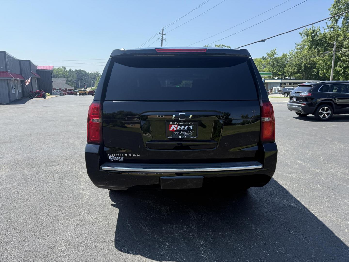 2016 Black /Black Chevrolet Suburban LTZ 4WD (1GNSKJKC6GR) with an 5.3L V8 OHV 16V engine, 6A transmission, located at 11115 Chardon Rd. , Chardon, OH, 44024, (440) 214-9705, 41.580246, -81.241943 - This 2016 Chevrolet Suburban LTZ 4WD is a full-size SUV powered by a 5.3L EcoTec3 V8 engine paired with a 6-speed automatic transmission and 3.42 rear axle gearing, offering an 8,000-pound towing capacity. It features a luxurious leather interior with heated and cooled front seats, heated second-row - Photo#9