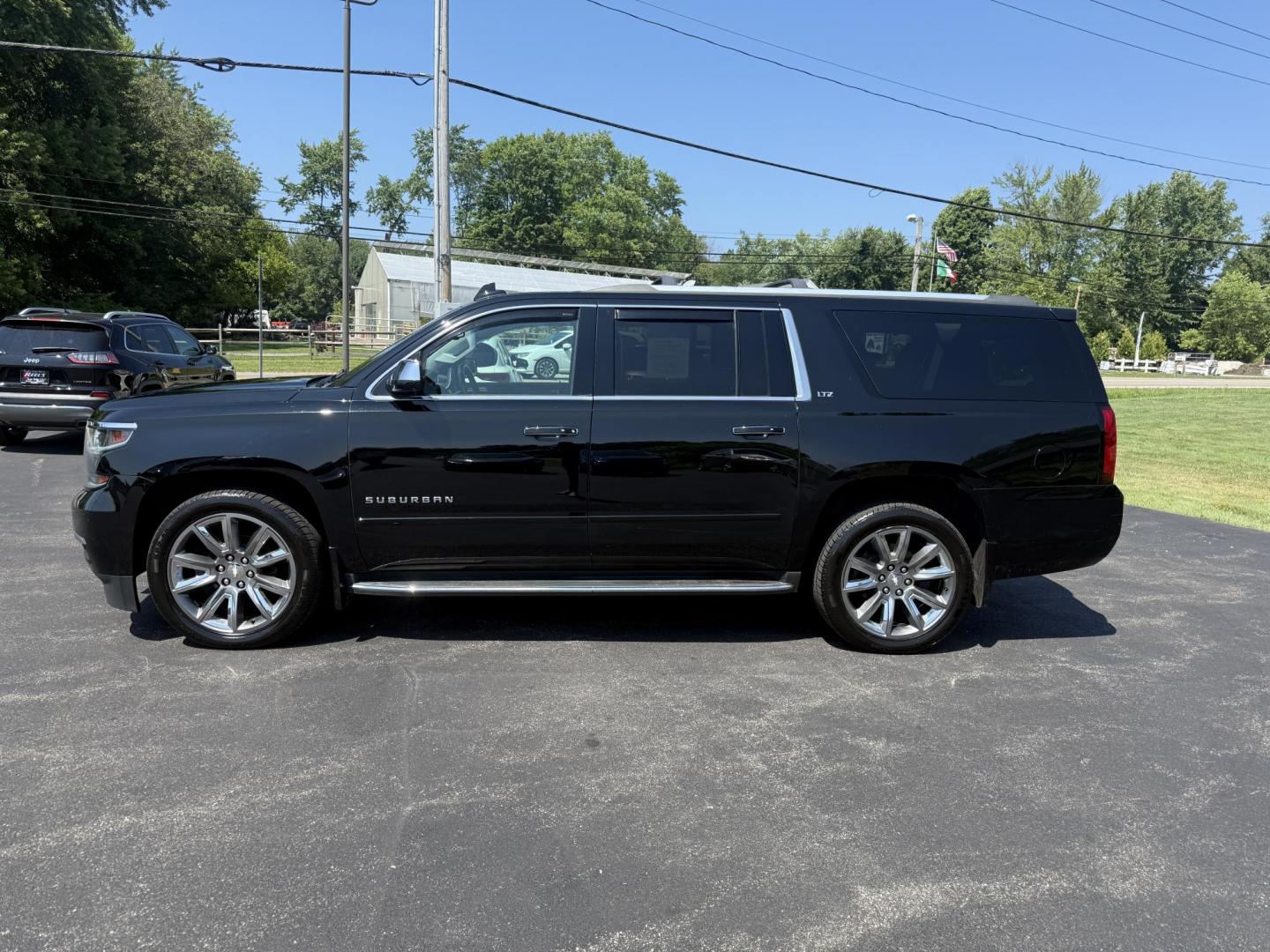 2016 Black /Black Chevrolet Suburban LTZ 4WD (1GNSKJKC6GR) with an 5.3L V8 OHV 16V engine, 6A transmission, located at 11115 Chardon Rd. , Chardon, OH, 44024, (440) 214-9705, 41.580246, -81.241943 - This 2016 Chevrolet Suburban LTZ 4WD is a full-size SUV powered by a 5.3L EcoTec3 V8 engine paired with a 6-speed automatic transmission and 3.42 rear axle gearing, offering an 8,000-pound towing capacity. It features a luxurious leather interior with heated and cooled front seats, heated second-row - Photo#13