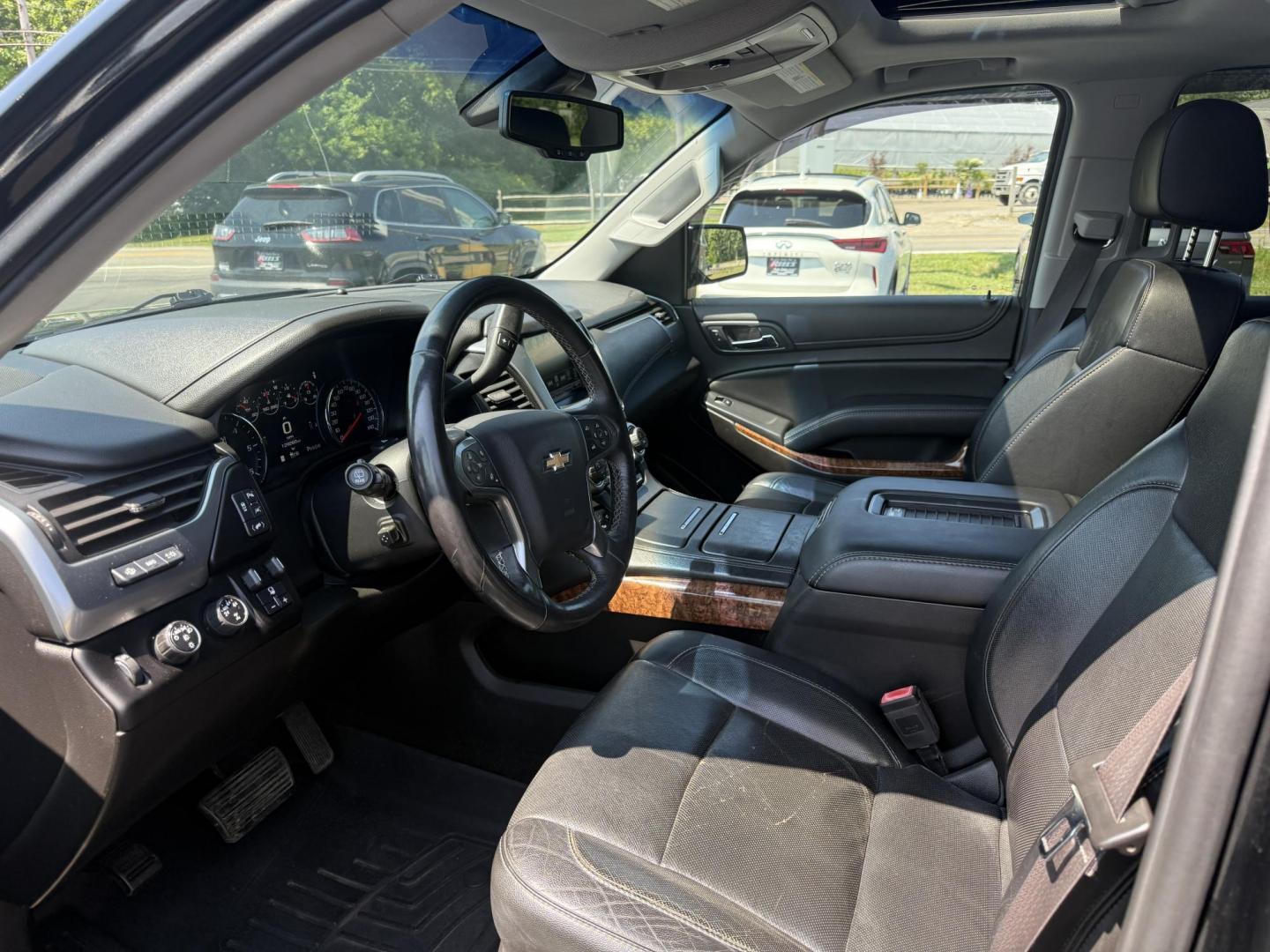 2016 Black /Black Chevrolet Suburban LTZ 4WD (1GNSKJKC6GR) with an 5.3L V8 OHV 16V engine, 6A transmission, located at 11115 Chardon Rd. , Chardon, OH, 44024, (440) 214-9705, 41.580246, -81.241943 - This 2016 Chevrolet Suburban LTZ 4WD is a full-size SUV powered by a 5.3L EcoTec3 V8 engine paired with a 6-speed automatic transmission and 3.42 rear axle gearing, offering an 8,000-pound towing capacity. It features a luxurious leather interior with heated and cooled front seats, heated second-row - Photo#9