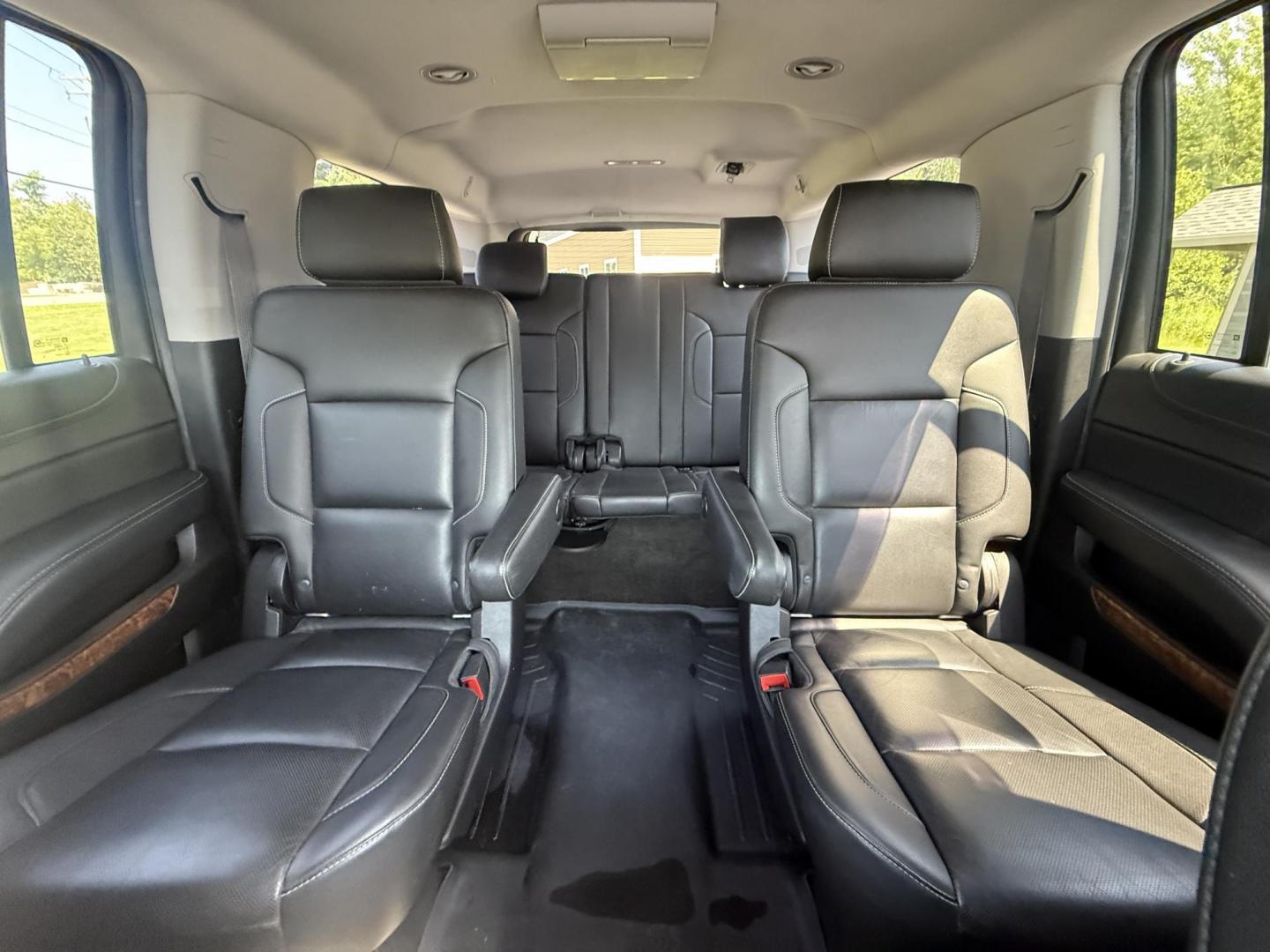 2016 Black /Black Chevrolet Suburban LTZ 4WD (1GNSKJKC6GR) with an 5.3L V8 OHV 16V engine, 6A transmission, located at 11115 Chardon Rd. , Chardon, OH, 44024, (440) 214-9705, 41.580246, -81.241943 - This 2016 Chevrolet Suburban LTZ 4WD is a full-size SUV powered by a 5.3L EcoTec3 V8 engine paired with a 6-speed automatic transmission and 3.42 rear axle gearing, offering an 8,000-pound towing capacity. It features a luxurious leather interior with heated and cooled front seats, heated second-row - Photo#28
