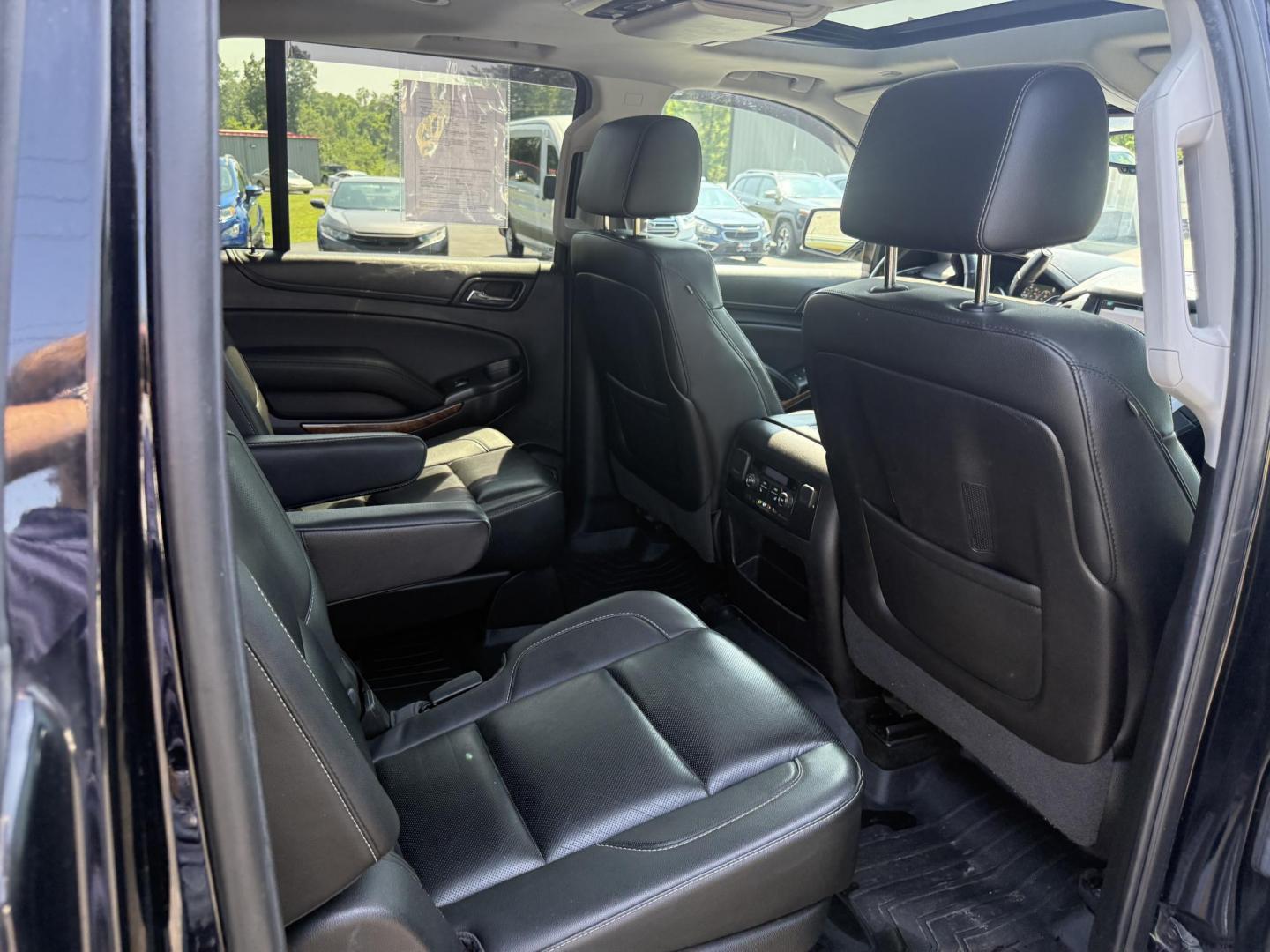 2016 Black /Black Chevrolet Suburban LTZ 4WD (1GNSKJKC6GR) with an 5.3L V8 OHV 16V engine, 6A transmission, located at 11115 Chardon Rd. , Chardon, OH, 44024, (440) 214-9705, 41.580246, -81.241943 - This 2016 Chevrolet Suburban LTZ 4WD is a full-size SUV powered by a 5.3L EcoTec3 V8 engine paired with a 6-speed automatic transmission and 3.42 rear axle gearing, offering an 8,000-pound towing capacity. It features a luxurious leather interior with heated and cooled front seats, heated second-row - Photo#39
