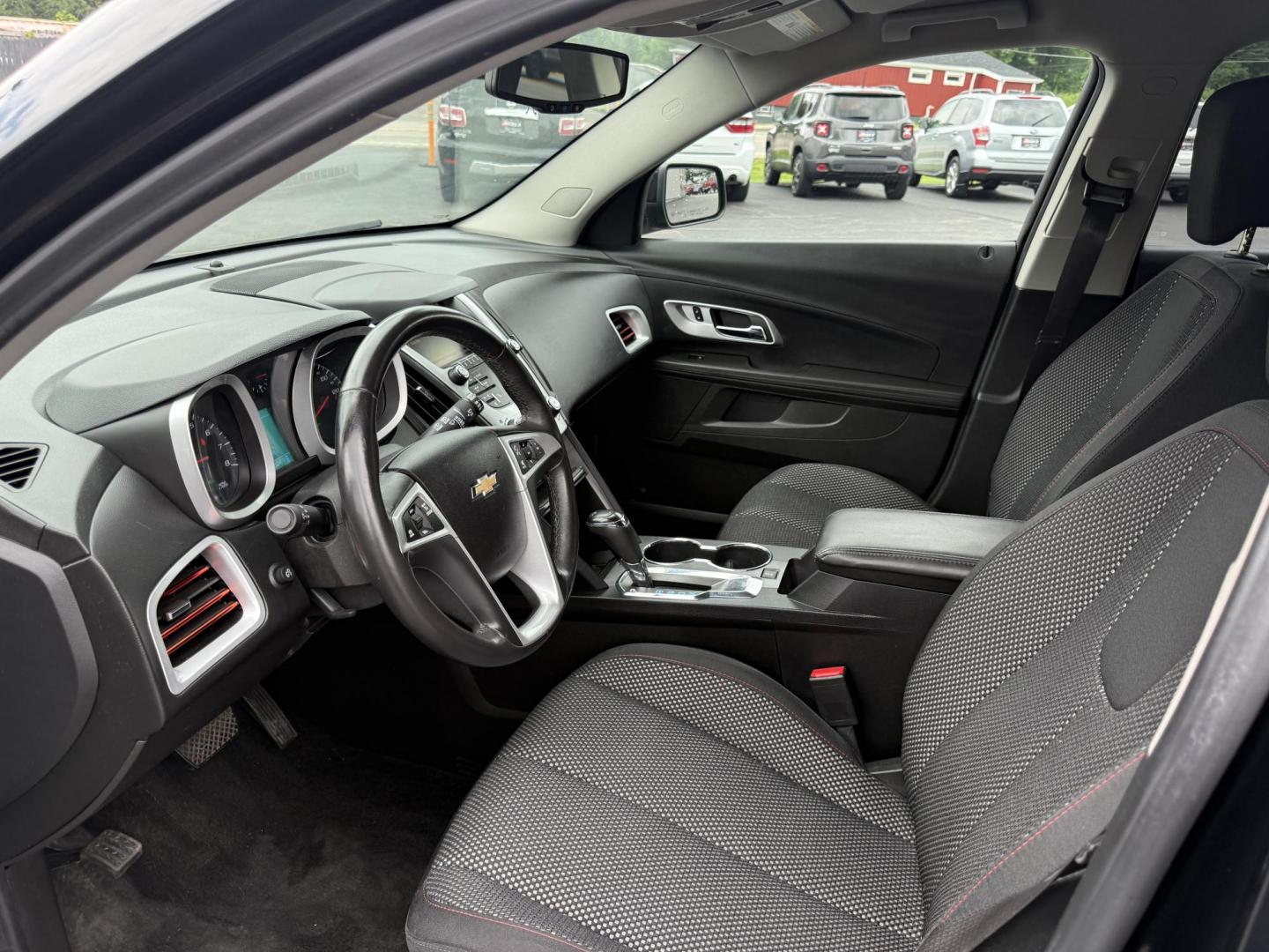 2017 Black /Black Chevrolet Equinox LT AWD (2GNFLFEK2H6) with an 2.4L I4 DOHC 16V engine, 6A transmission, located at 11115 Chardon Rd. , Chardon, OH, 44024, (440) 214-9705, 41.580246, -81.241943 - This 2017 Chevrolet Equinox LT AWD is a compact SUV powered by a 2.4L EcoTec I4 engine paired with a 6-speed automatic transmission, delivering up to 28 MPG on the highway. It features a 7-inch touchscreen with a backup camera, single-zone automatic climate control, heated front seats, a power drive - Photo#8