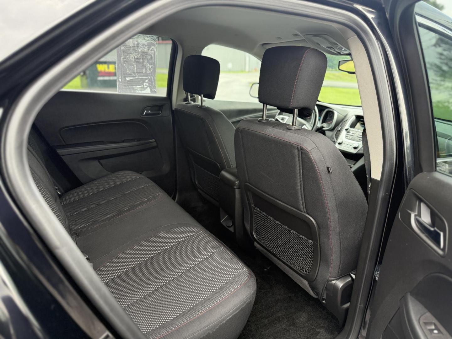 2017 Black /Black Chevrolet Equinox LT AWD (2GNFLFEK2H6) with an 2.4L I4 DOHC 16V engine, 6A transmission, located at 11115 Chardon Rd. , Chardon, OH, 44024, (440) 214-9705, 41.580246, -81.241943 - This 2017 Chevrolet Equinox LT AWD is a compact SUV powered by a 2.4L EcoTec I4 engine paired with a 6-speed automatic transmission, delivering up to 28 MPG on the highway. It features a 7-inch touchscreen with a backup camera, single-zone automatic climate control, heated front seats, a power drive - Photo#27