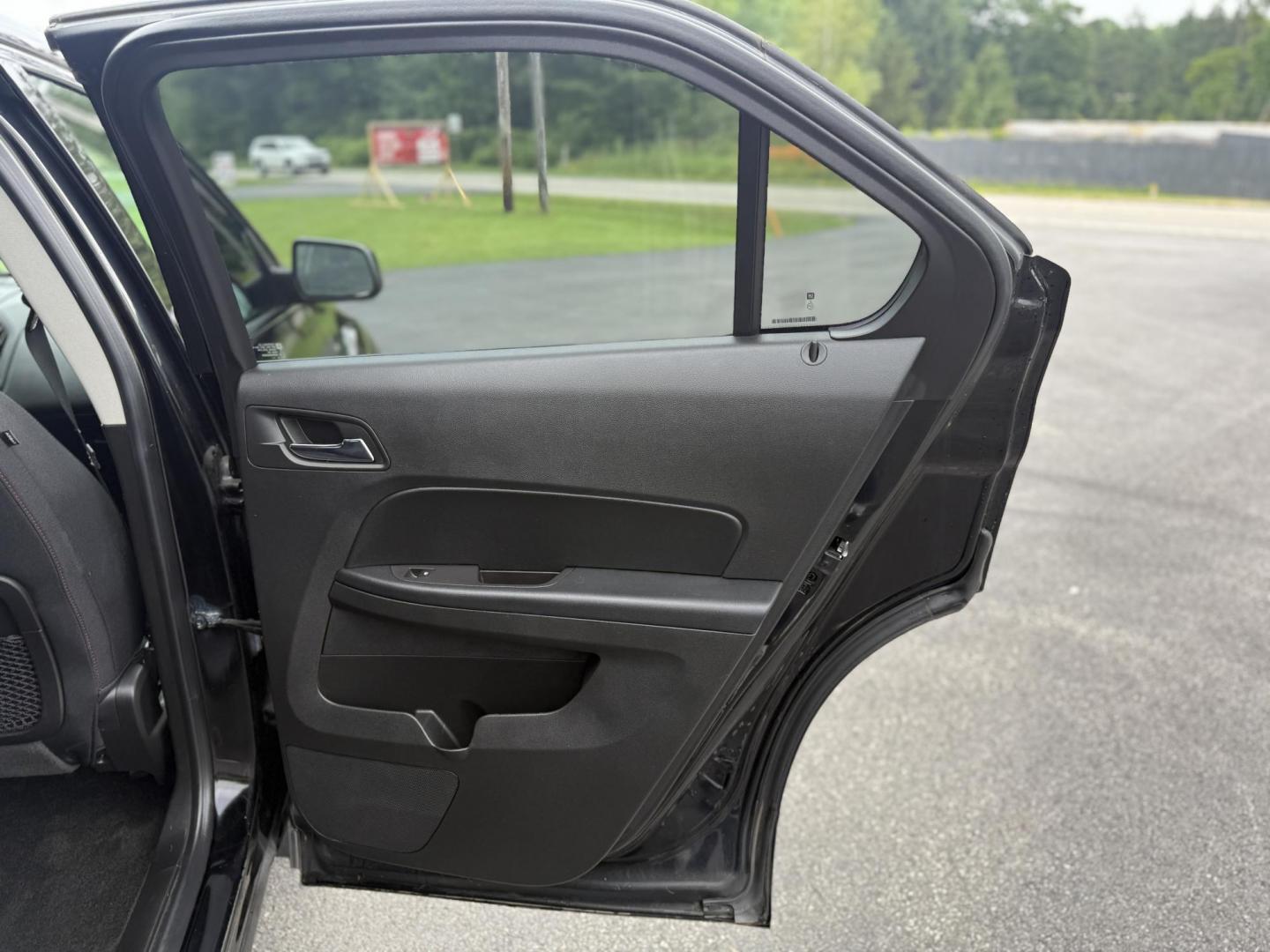 2017 Black /Black Chevrolet Equinox LT AWD (2GNFLFEK2H6) with an 2.4L I4 DOHC 16V engine, 6A transmission, located at 11115 Chardon Rd. , Chardon, OH, 44024, (440) 214-9705, 41.580246, -81.241943 - This 2017 Chevrolet Equinox LT AWD is a compact SUV powered by a 2.4L EcoTec I4 engine paired with a 6-speed automatic transmission, delivering up to 28 MPG on the highway. It features a 7-inch touchscreen with a backup camera, single-zone automatic climate control, heated front seats, a power drive - Photo#28