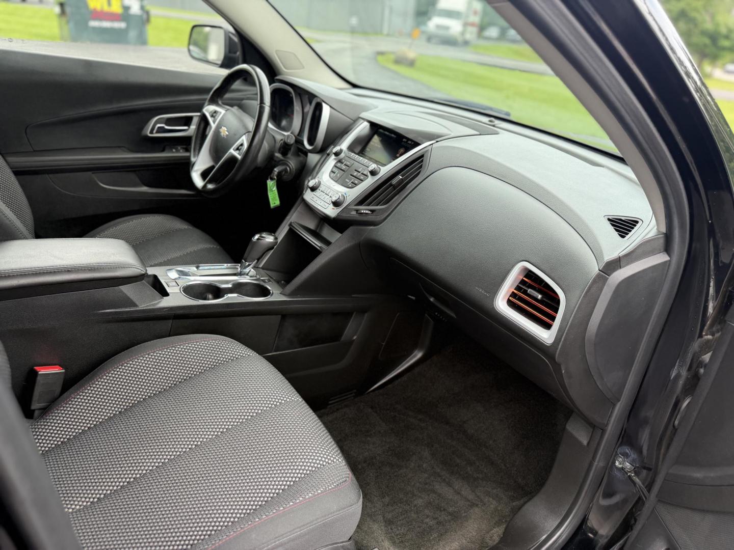 2017 Black /Black Chevrolet Equinox LT AWD (2GNFLFEK2H6) with an 2.4L I4 DOHC 16V engine, 6A transmission, located at 11115 Chardon Rd. , Chardon, OH, 44024, (440) 214-9705, 41.580246, -81.241943 - This 2017 Chevrolet Equinox LT AWD is a compact SUV powered by a 2.4L EcoTec I4 engine paired with a 6-speed automatic transmission, delivering up to 28 MPG on the highway. It features a 7-inch touchscreen with a backup camera, single-zone automatic climate control, heated front seats, a power drive - Photo#29