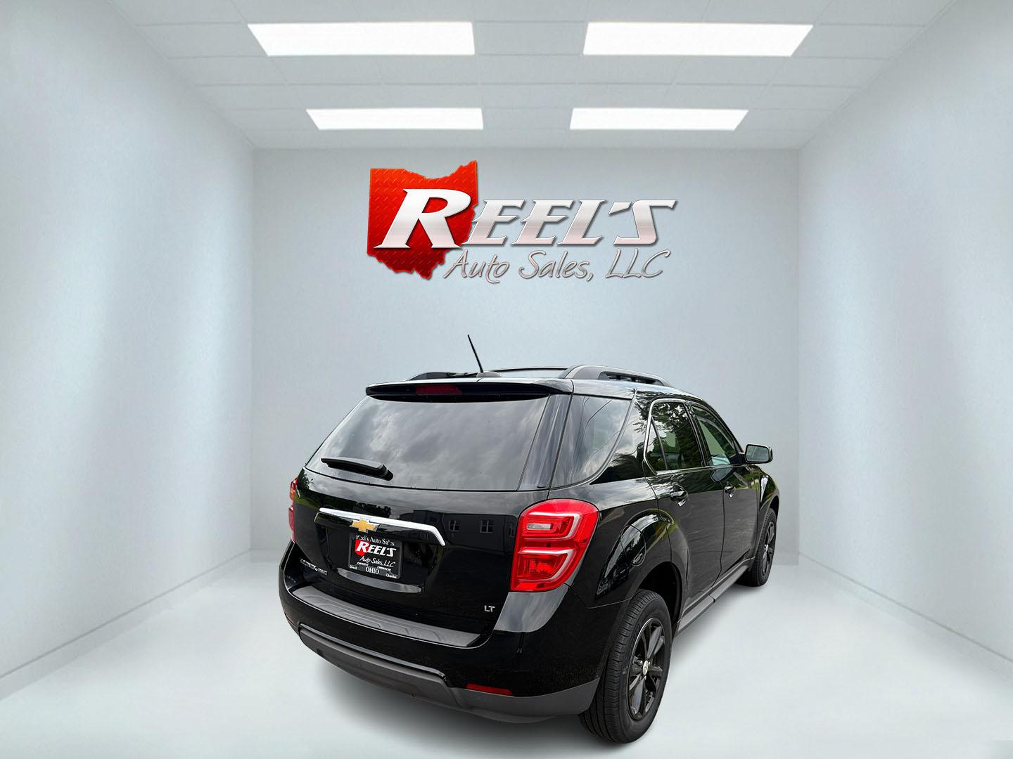 2017 Black /Black Chevrolet Equinox LT AWD (2GNFLFEK2H6) with an 2.4L I4 DOHC 16V engine, 6A transmission, located at 11115 Chardon Rd. , Chardon, OH, 44024, (440) 214-9705, 41.580246, -81.241943 - This 2017 Chevrolet Equinox LT AWD is a compact SUV powered by a 2.4L EcoTec I4 engine paired with a 6-speed automatic transmission, delivering up to 28 MPG on the highway. It features a 7-inch touchscreen with a backup camera, single-zone automatic climate control, heated front seats, a power drive - Photo#35