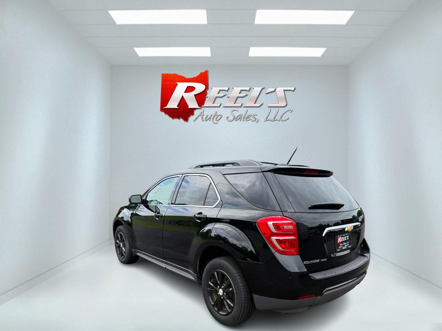 2017 Black /Black Chevrolet Equinox LT AWD (2GNFLFEK2H6) with an 2.4L I4 DOHC 16V engine, 6A transmission, located at 11115 Chardon Rd. , Chardon, OH, 44024, (440) 214-9705, 41.580246, -81.241943 - This 2017 Chevrolet Equinox LT AWD is a compact SUV powered by a 2.4L EcoTec I4 engine paired with a 6-speed automatic transmission, delivering up to 28 MPG on the highway. It features a 7-inch touchscreen with a backup camera, single-zone automatic climate control, heated front seats, a power drive - Photo#37