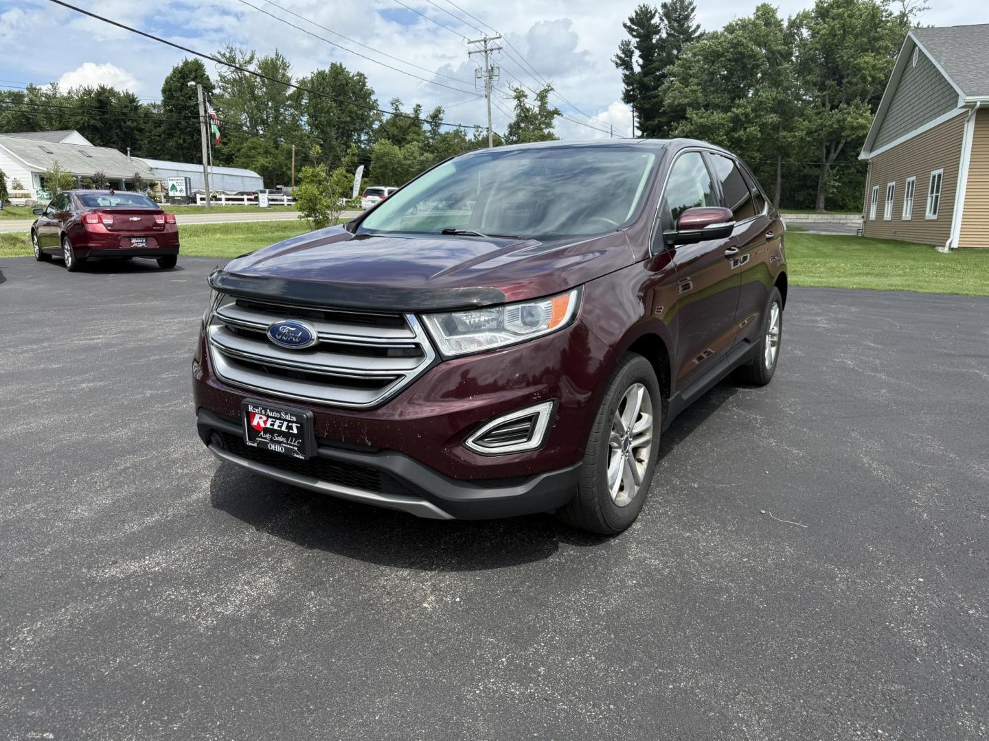 2017 Burgundy /Black Ford Edge SEL AWD (2FMPK4J99HB) with an 2.0L L4 DOHC 16V engine, 6A transmission, located at 11115 Chardon Rd. , Chardon, OH, 44024, (440) 214-9705, 41.580246, -81.241943 - This 2017 Ford Edge SEL AWD is a midsize SUV featuring a turbocharged 2.0L EcoBoost I4 engine and a 6-speed automatic transmission, achieving up to 27 MPG on the highway. It offers a premium leather interior with heated front seats, a power panoramic moonroof, an 8-inch touchscreen with navigation, - Photo#0