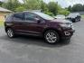 2017 Burgundy /Black Ford Edge SEL AWD (2FMPK4J99HB) with an 2.0L L4 DOHC 16V engine, 6A transmission, located at 11115 Chardon Rd. , Chardon, OH, 44024, (440) 214-9705, 41.580246, -81.241943 - This 2017 Ford Edge SEL AWD is a midsize SUV featuring a turbocharged 2.0L EcoBoost I4 engine and a 6-speed automatic transmission, achieving up to 27 MPG on the highway. It offers a premium leather interior with heated front seats, a power panoramic moonroof, an 8-inch touchscreen with navigation, - Photo#3